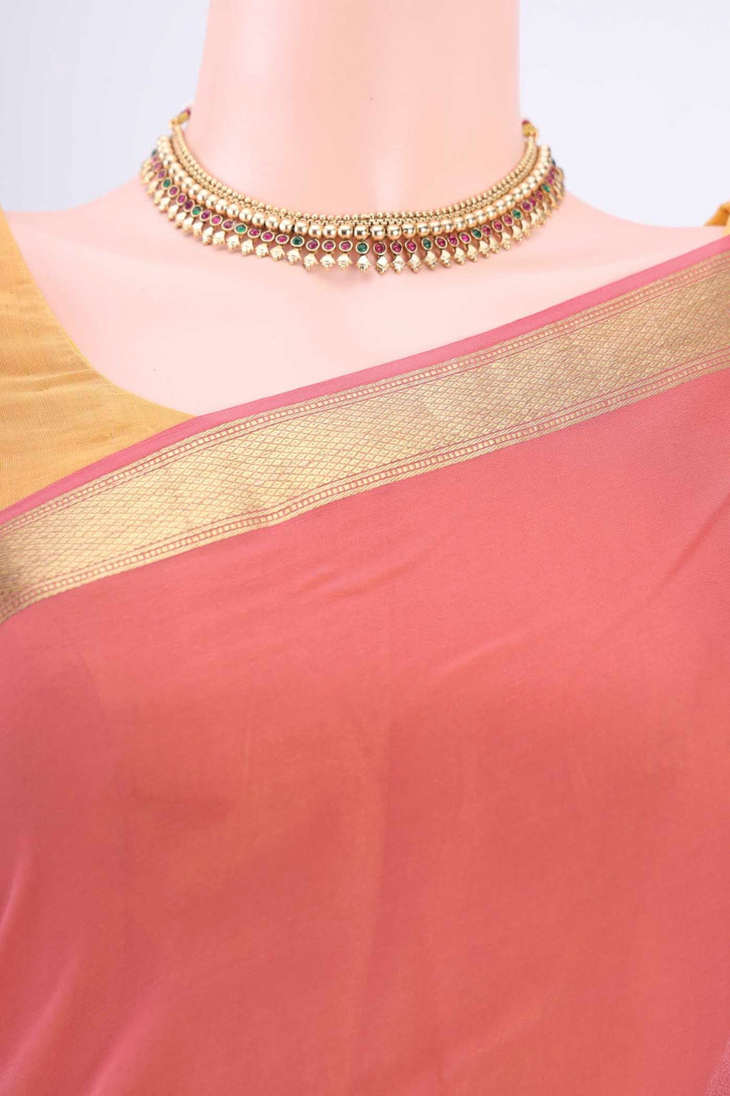 Border image of Peach Mysore Georgette Saree with Plain Body and Zari Border