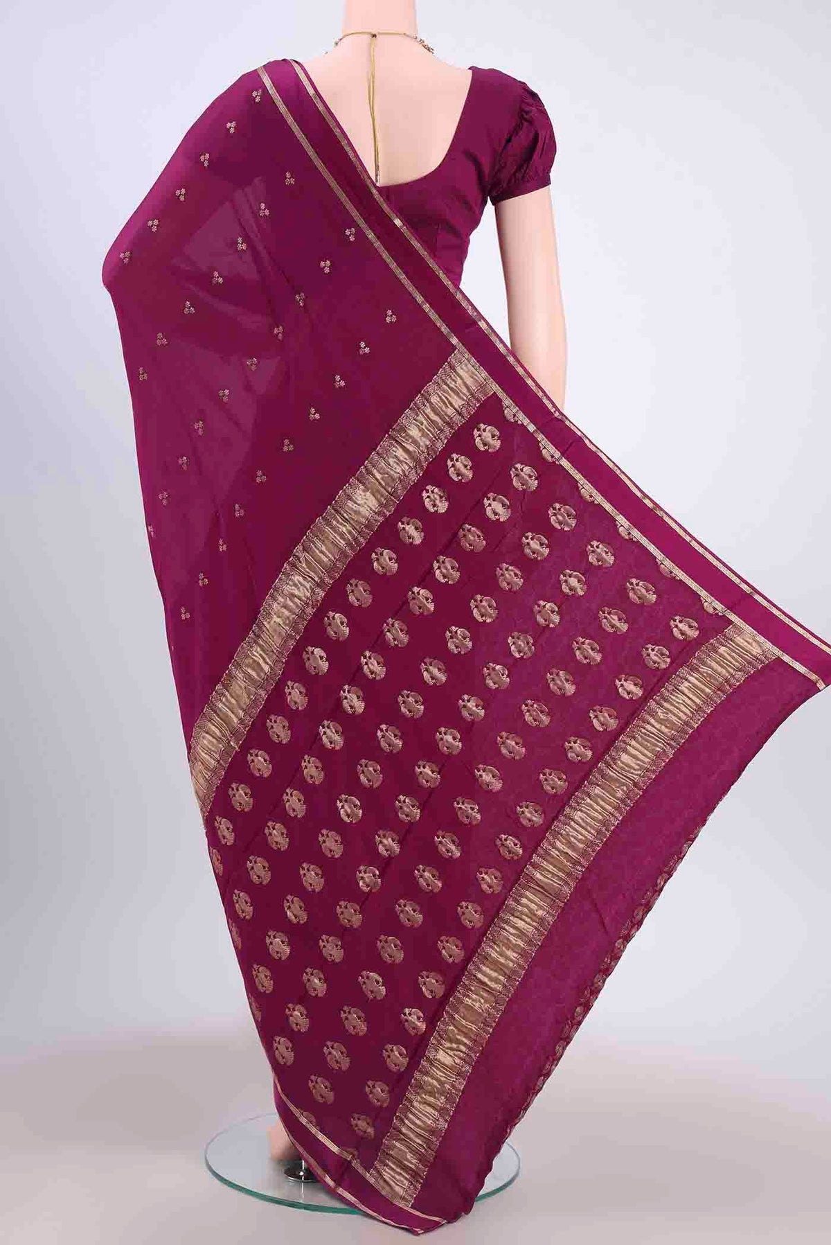 Flat view of Magenta Mysore Crepe Saree with Zari Butta on the body and Satin Border