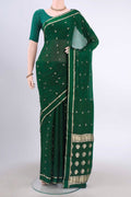Bottle Green Mysore Crepe Saree with Zari Butta on the body and Satin Border displayed on a mannequin