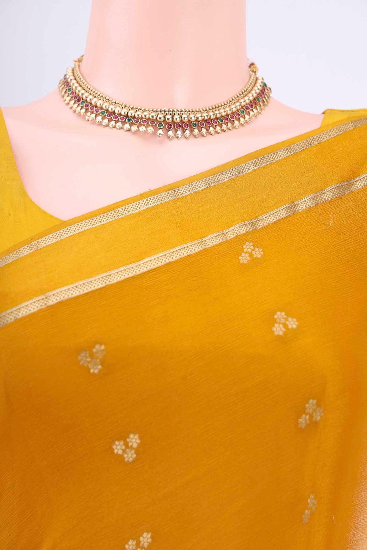 Border image of Mustard Mysore Crepe Saree with Zari Butta on the body and Satin Border
