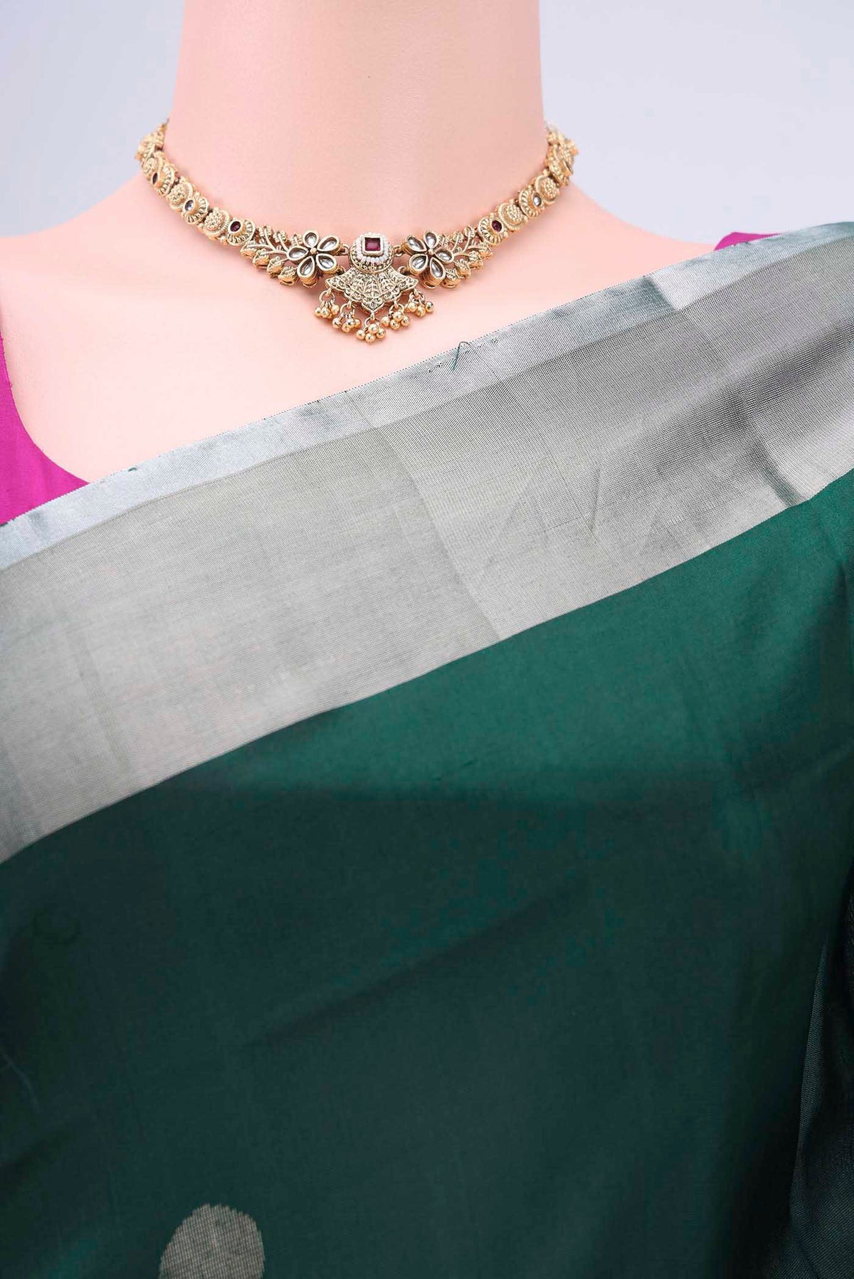 Border image of Green Uppada Silk Saree with Polka Dots on the body and Zari Border