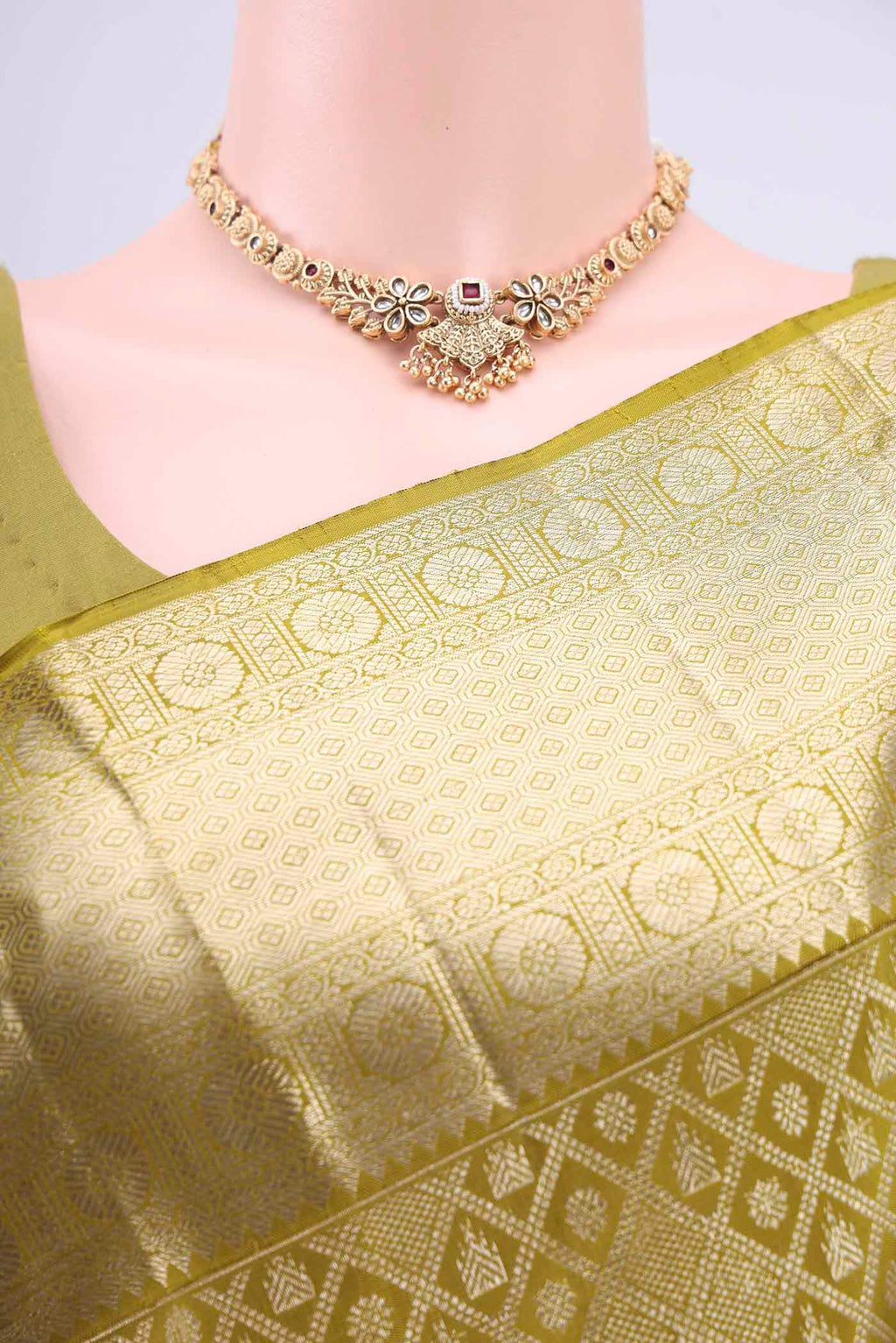 Border image of Light Green Kanchipuram Silk Saree with Zari Brocade on the body and Zari Border