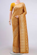 Mustard Kanchipuram Silk Saree with Zari Brocade on the body and Zari Border displayed on a mannequin