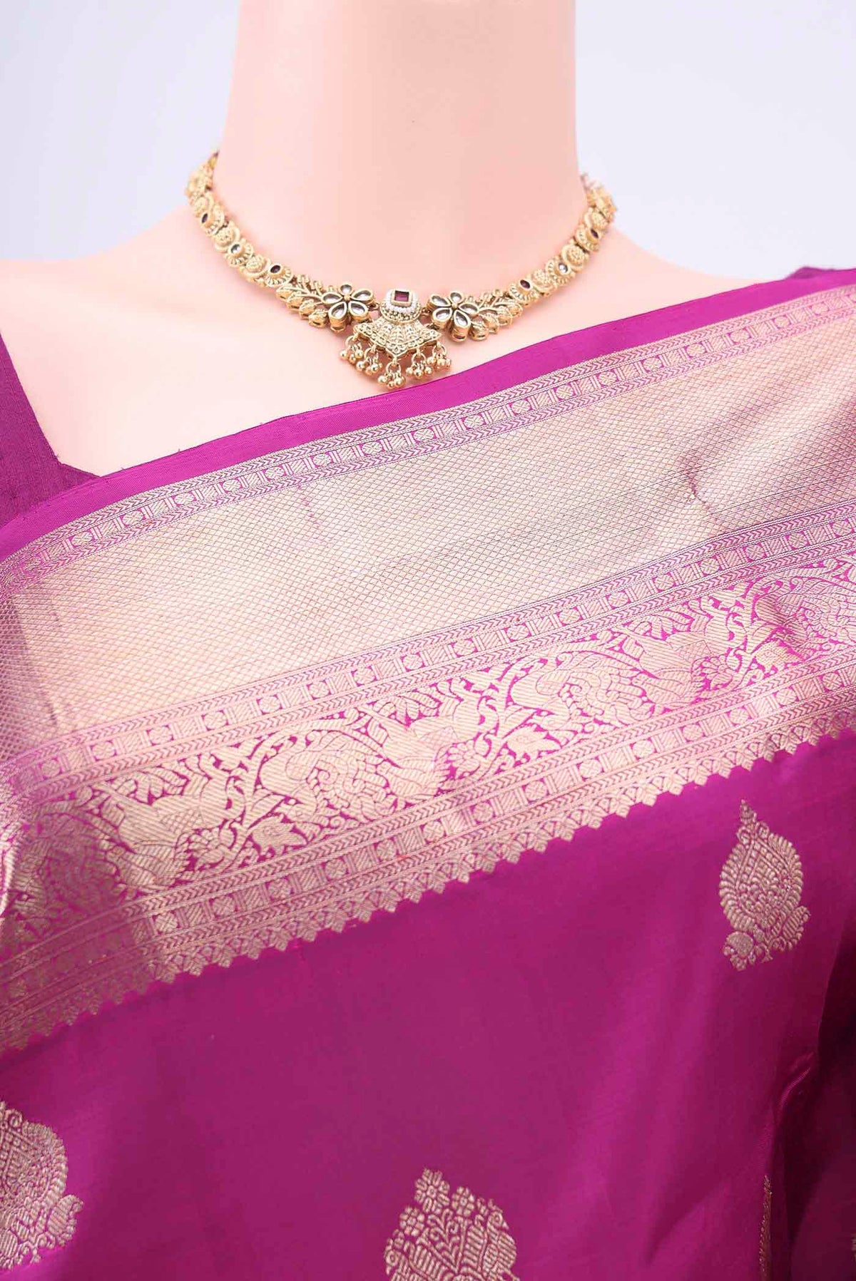 Border image of Magenta Kanchipuram Silk Saree with Zari Butta on the body and Zari Border