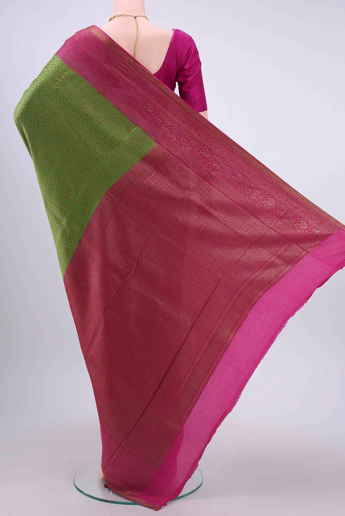 Flat view of Green Mysore Crepe Saree with Zari Brocade on the body and Zari Border