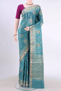 Blue Banarasi Tussar Silk Saree with Zari And Thread Butta on the body and Zari And Thread Border displayed on a mannequin