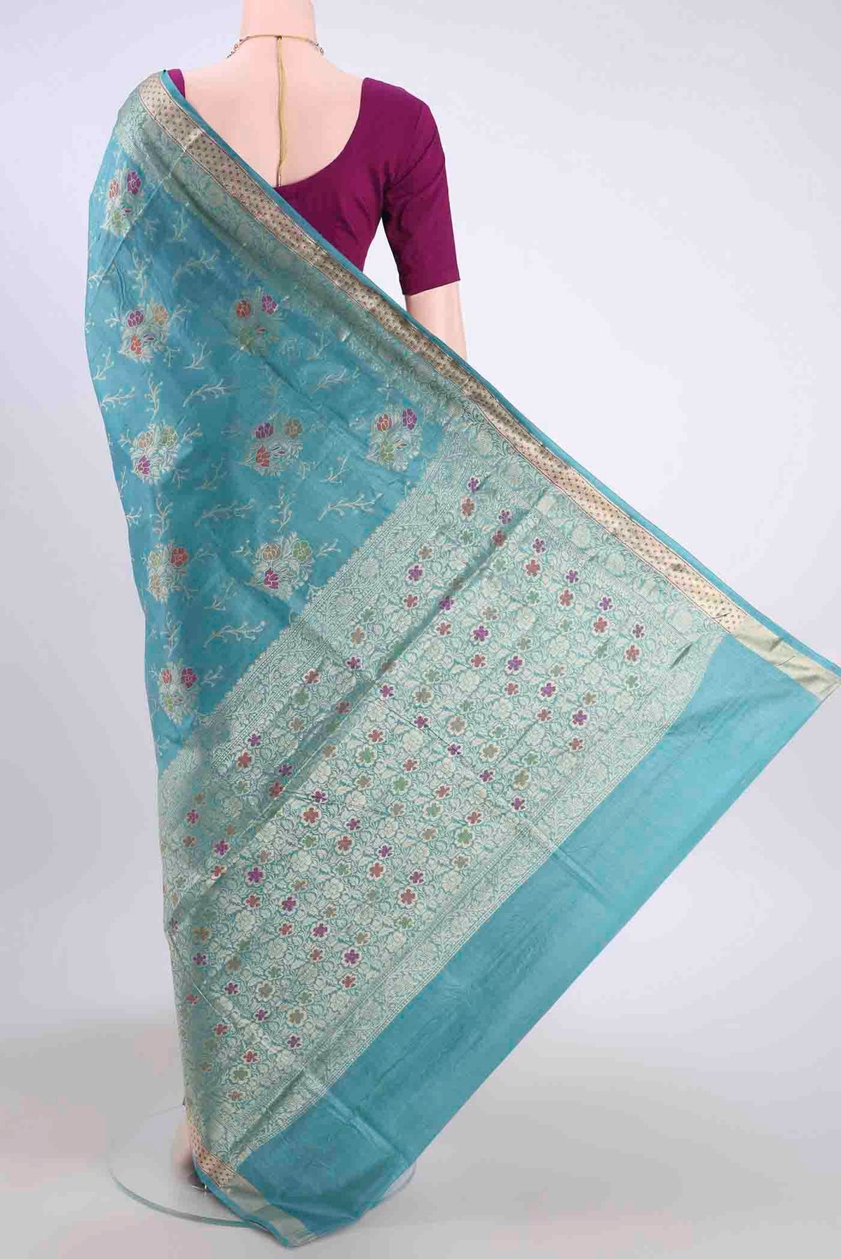 Flat view of Blue Banarasi Tussar Silk Saree with Zari And Thread Butta on the body and Zari And Thread Border