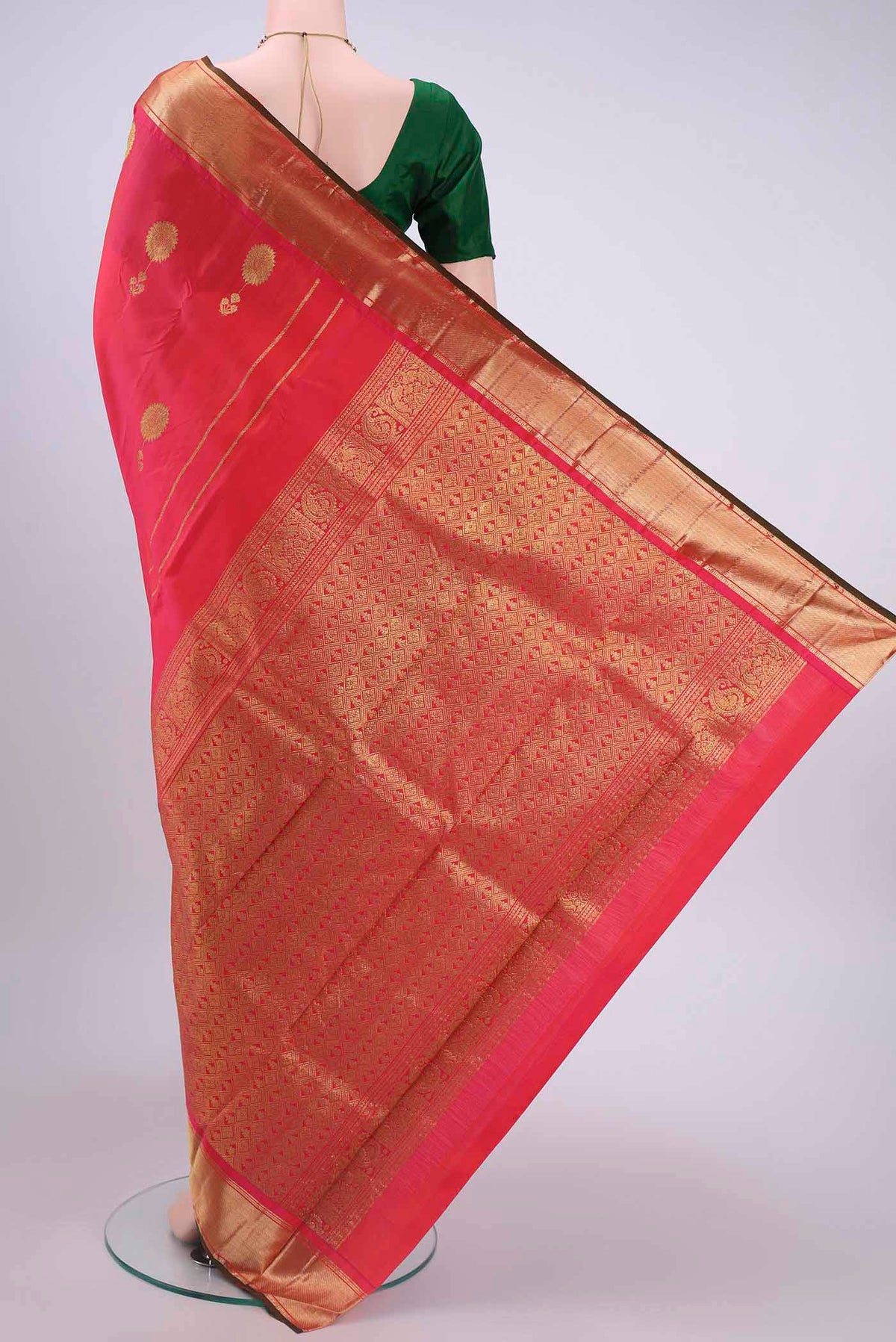 Flat view of Pink Kanchipuram Silk Saree with Zari Butta on the body and Zari Border