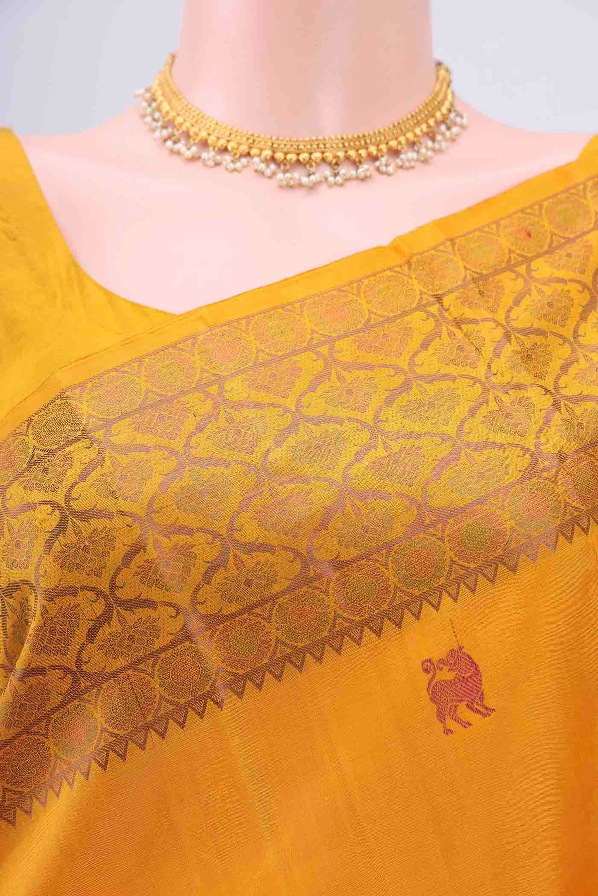 Border image of Pure Silk Pure Zari Mustard Kanchipuram Saree with Thread Butta on the body and Thread Border
