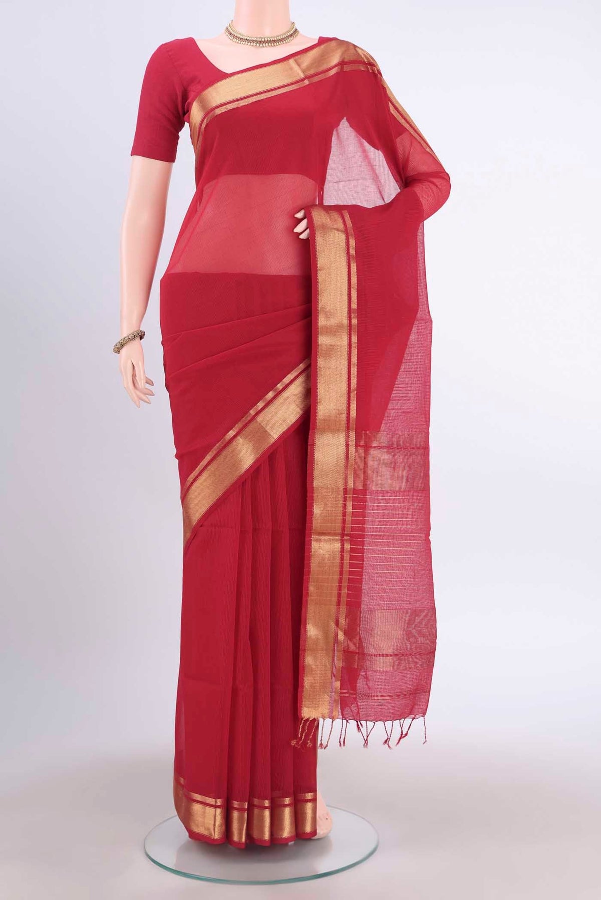 Red Maheshwari Silk Cotton Saree with Plain Body and Zari Border displayed on a mannequin