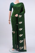Bottle Green Banarasi Katan Silk Saree with Zari Butta on the body and Zari Border displayed on a mannequin