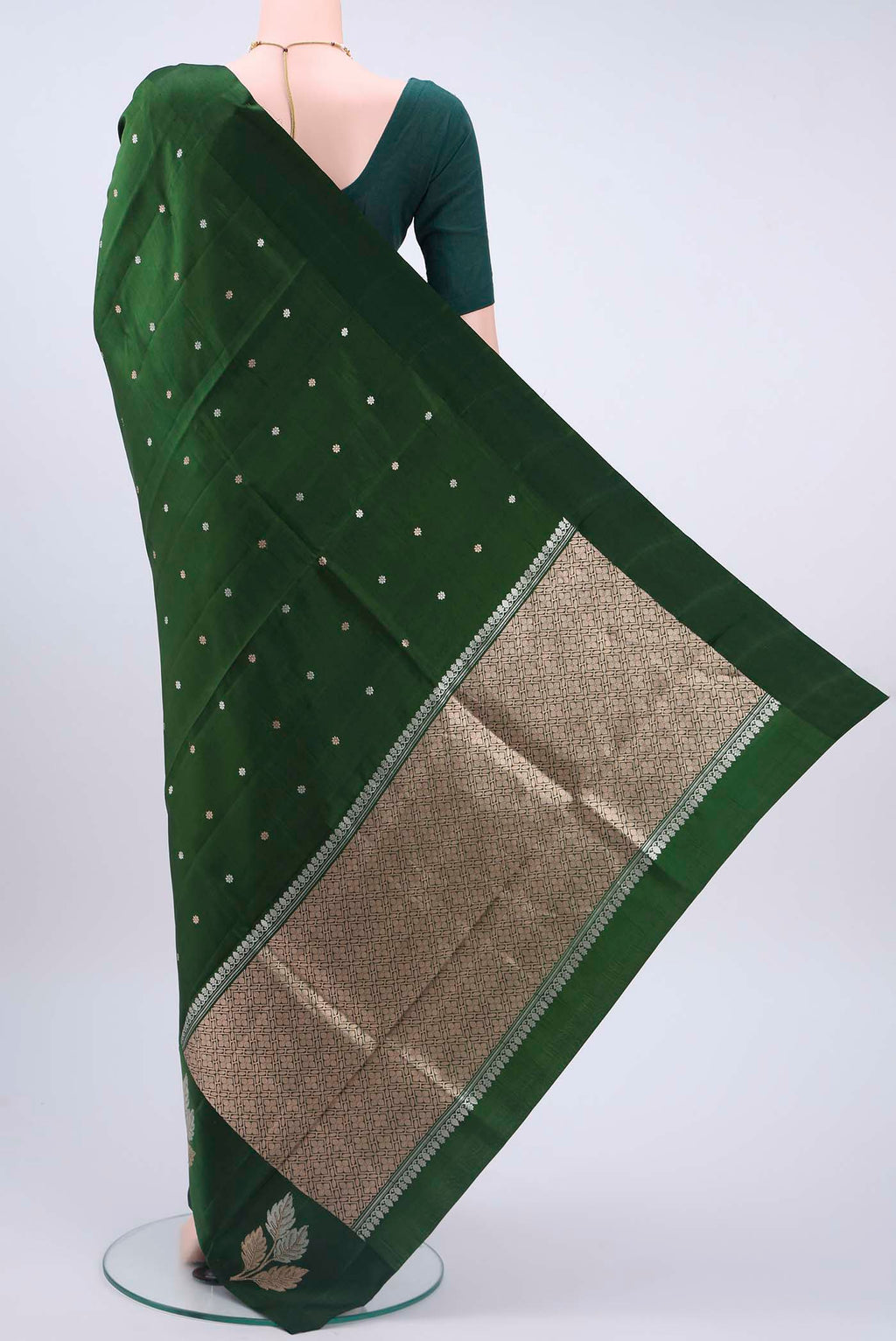 Flat view of Bottle Green Banarasi Katan Silk Saree with Zari Butta on the body and Zari Border