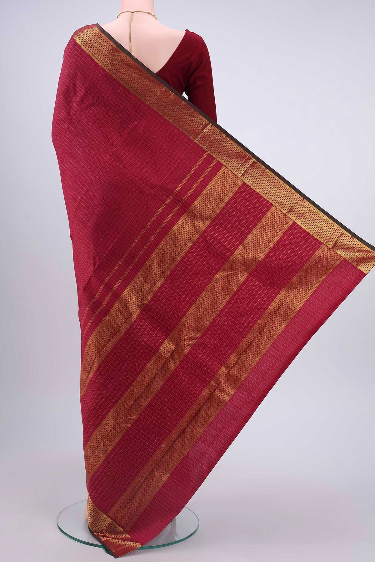 Flat view of Maroon Kanchipuram Silk Saree with Checked design on the body and Zari Border
