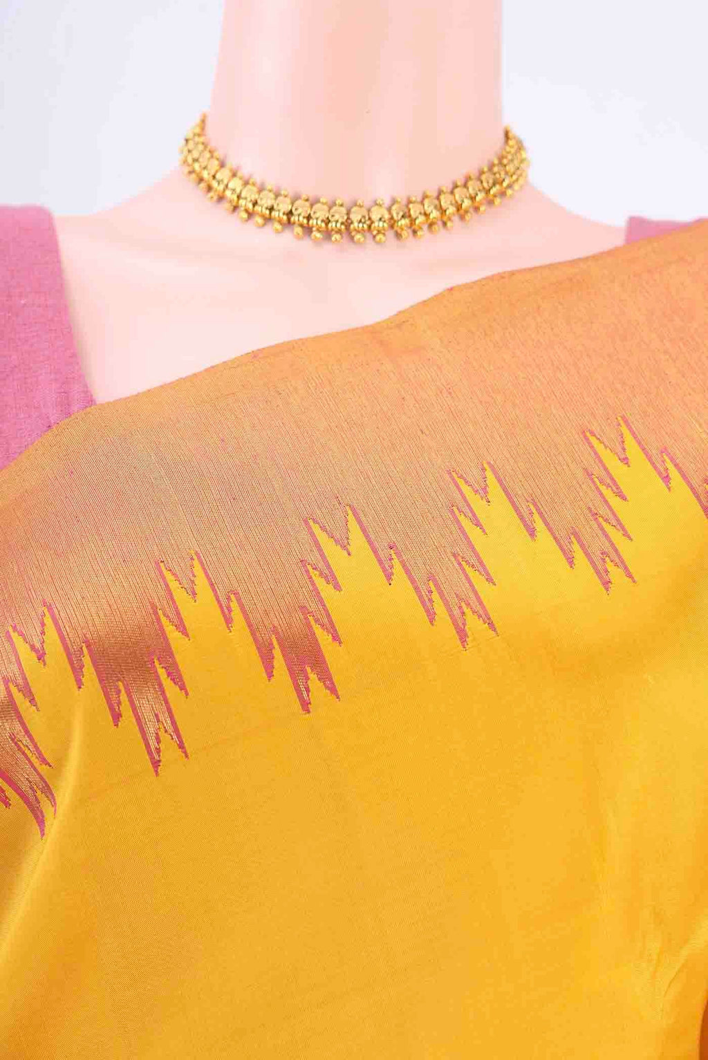 Border image of Yellow Kanchipuram Saree with Plain Body and Temple Border