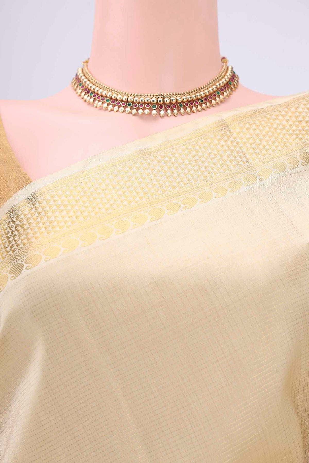 Border image of Cream Kanchipuram Silk Saree with Zari Brocade on the body and Zari Border