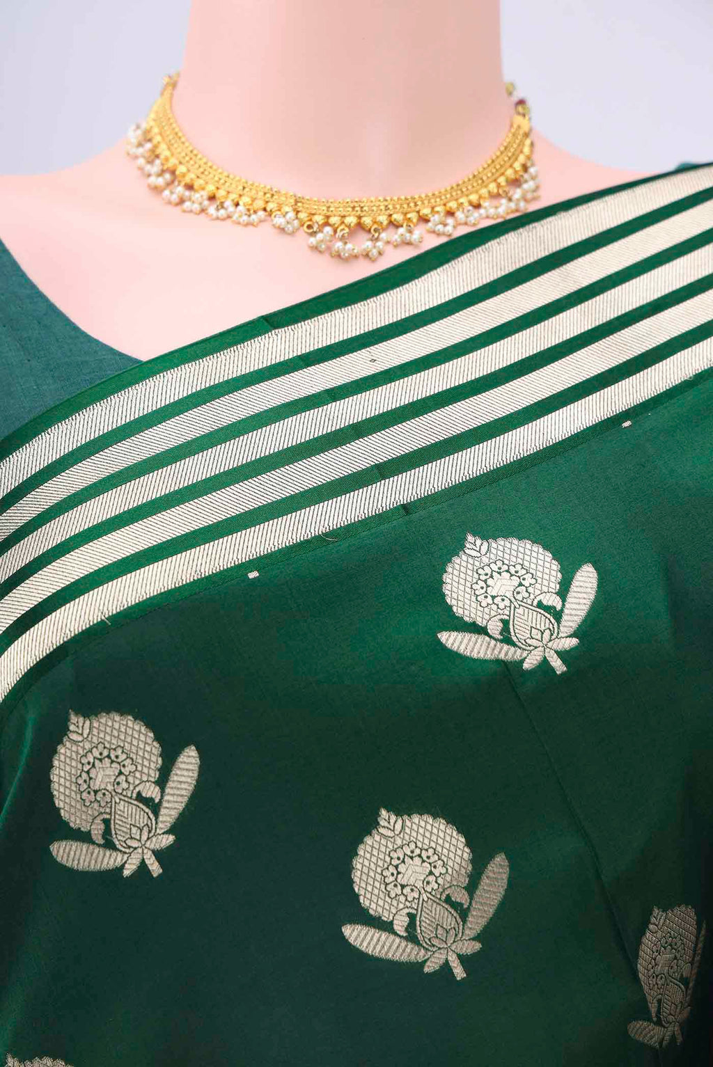 Border image of Bottle Green Dual Tone Banarasi Silk Saree with Zari Butta on the body and Zari Border