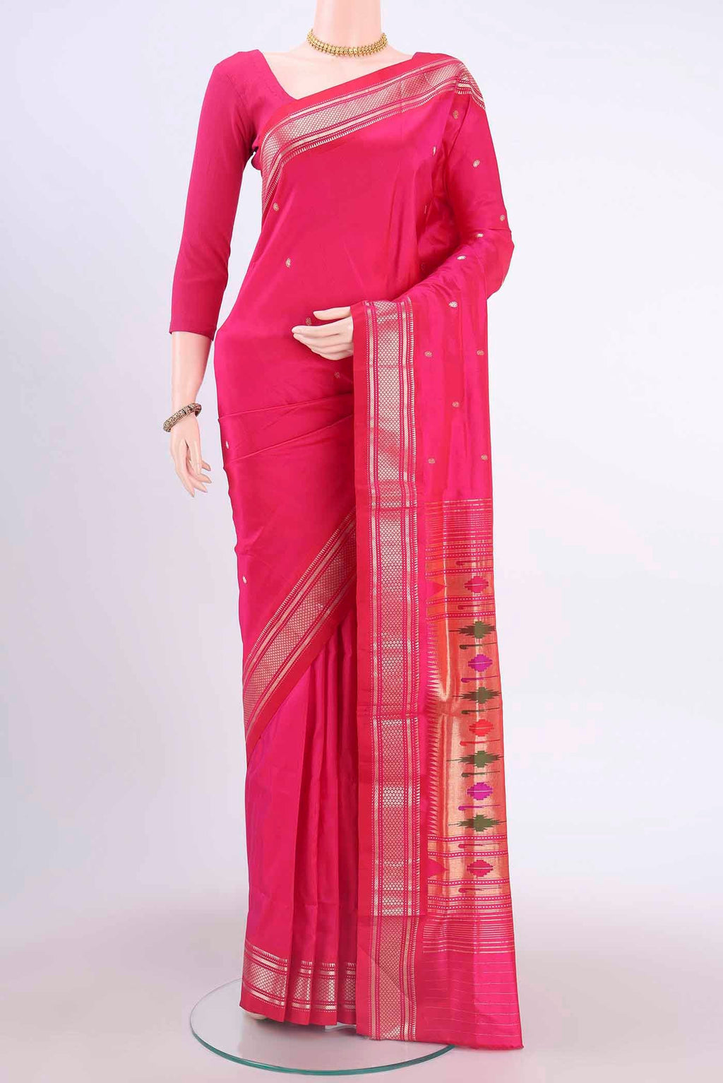 Dark Pink Paithani Silk Saree with Zari Butta on the body and Zari Border displayed on a mannequin