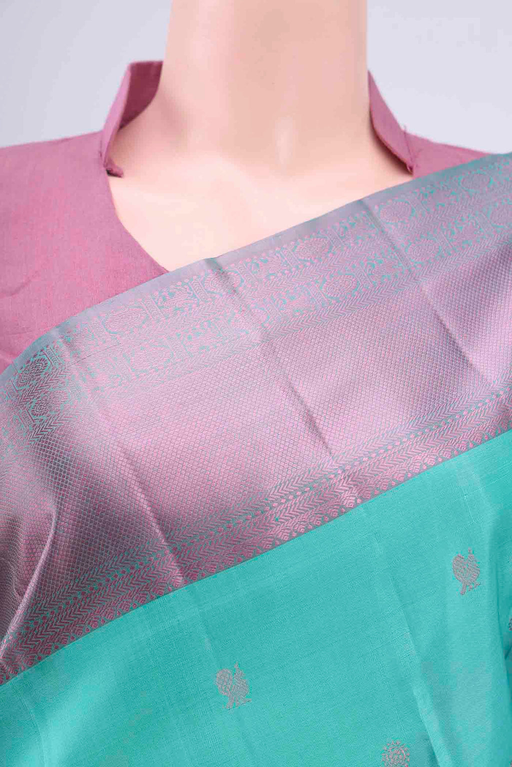 Border image of Turquoise Kanchipuram Silk Saree with Thread Butta on the body and Thread Border