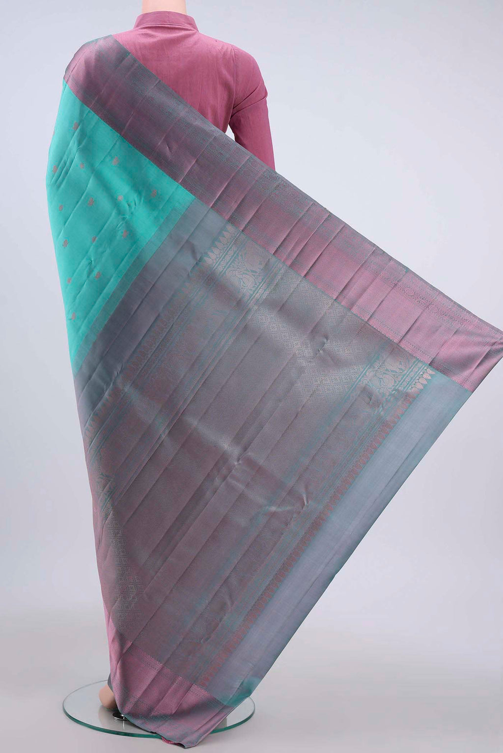 Flat view of Turquoise Kanchipuram Silk Saree with Thread Butta on the body and Thread Border