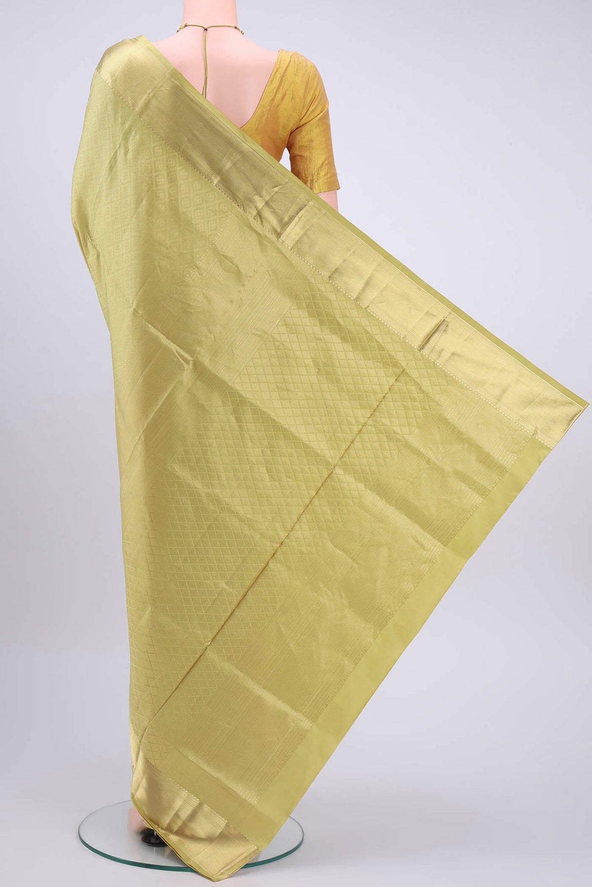 Flat view of Golden Soft Silk Saree with Zari Brocade on the body and Zari Border