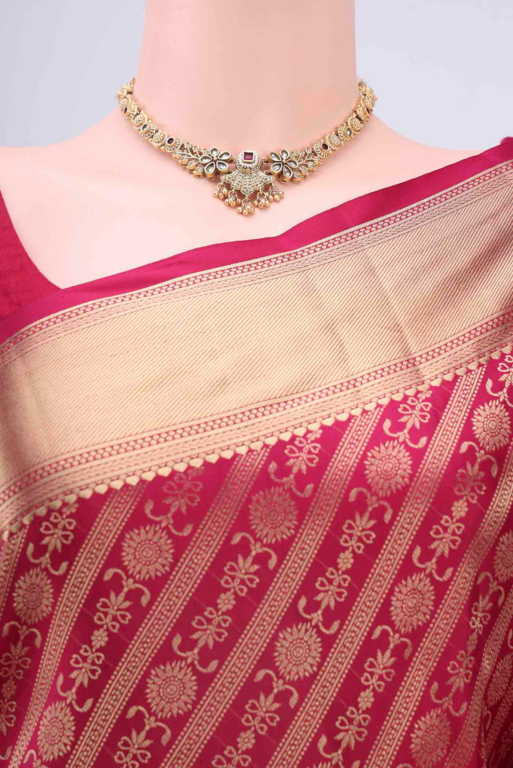 Border image of Rani Pink Soft Silk Saree with Zari Brocade on the body and Zari Border