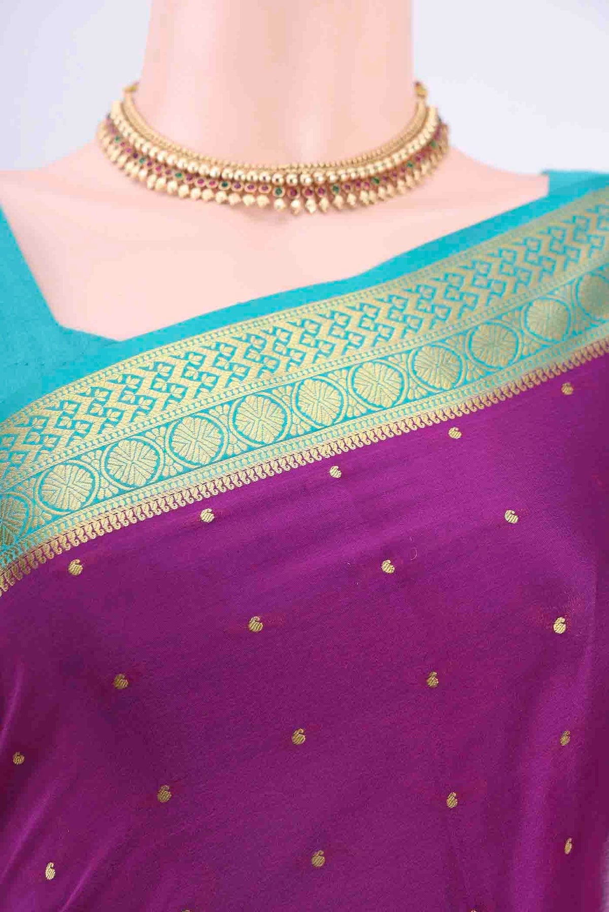 Border image of Purple Mysore Crepe Saree with Zari Butta on the body and Zari Border