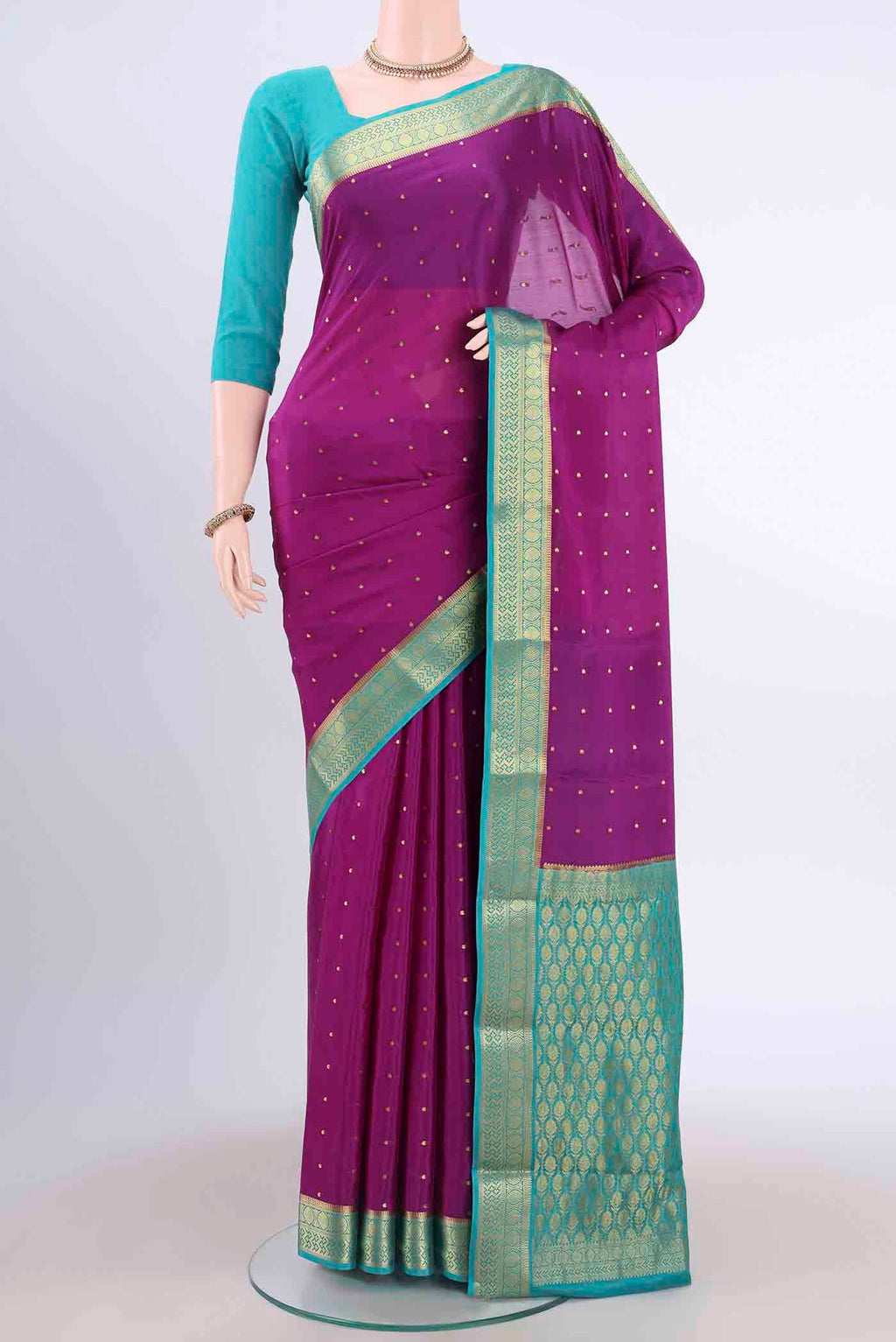 Purple Mysore Crepe Saree with Zari Butta on the body and Zari Border displayed on a mannequin