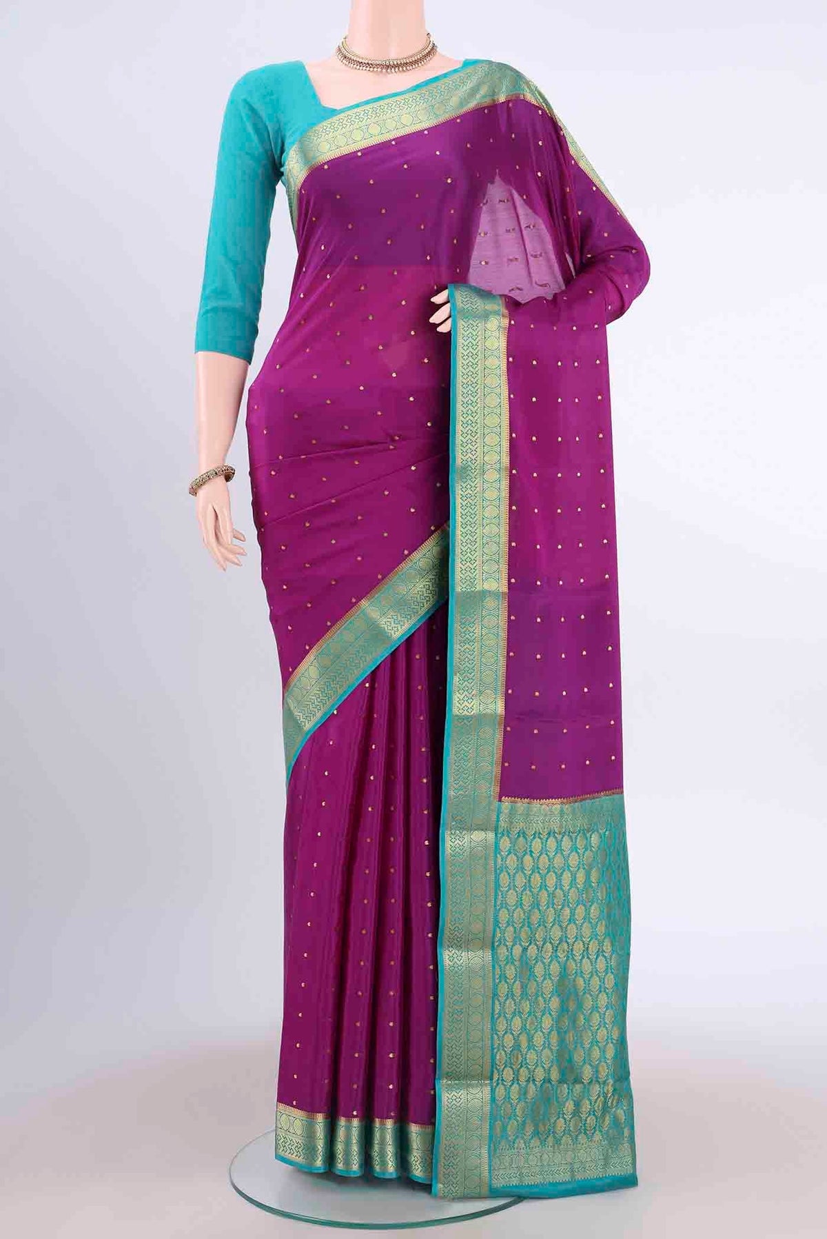 Purple Mysore Crepe Saree with Zari Butta on the body and Zari Border displayed on a mannequin