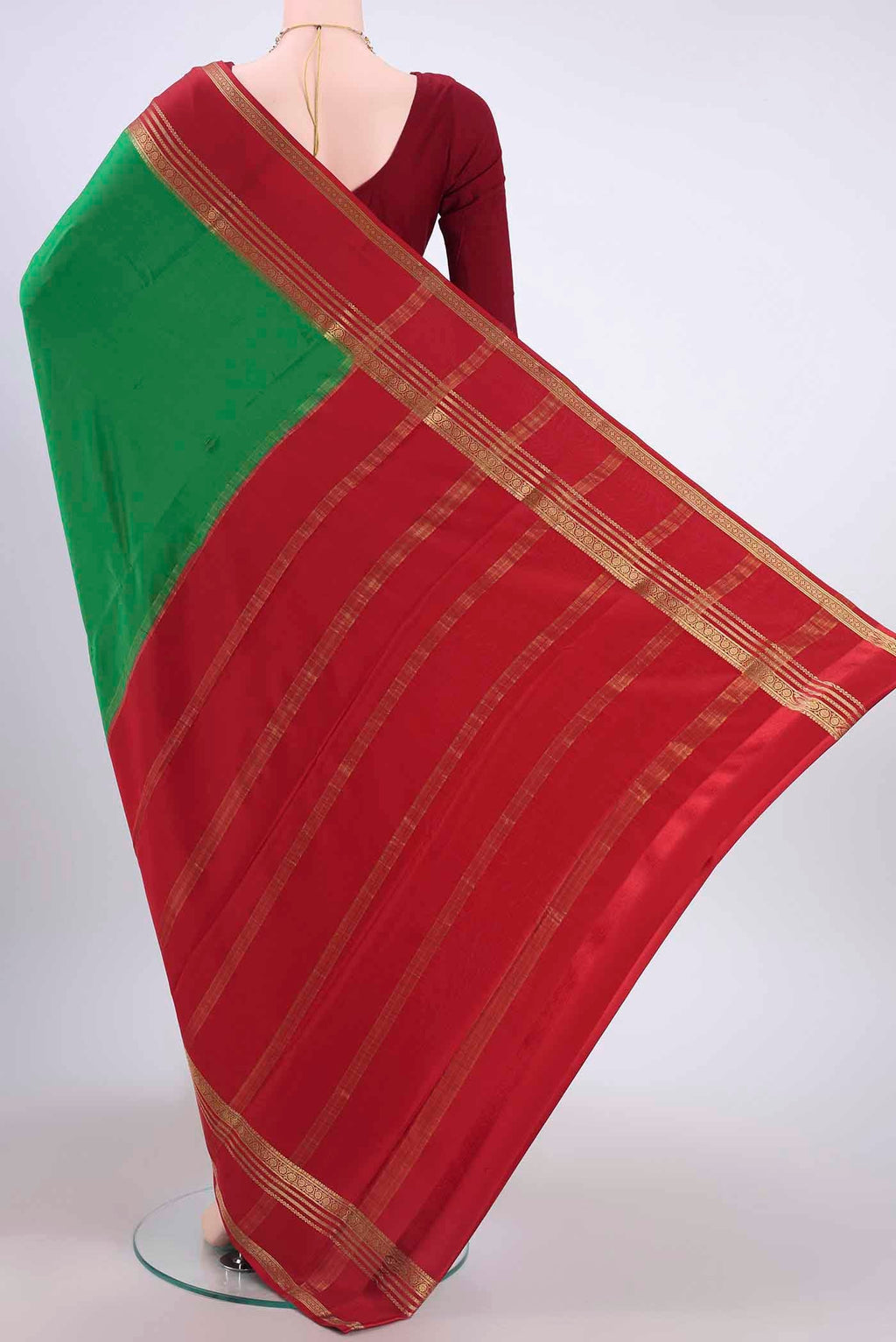 Flat view of Green Mysore Crepe Saree with Plain Body and Zari Border
