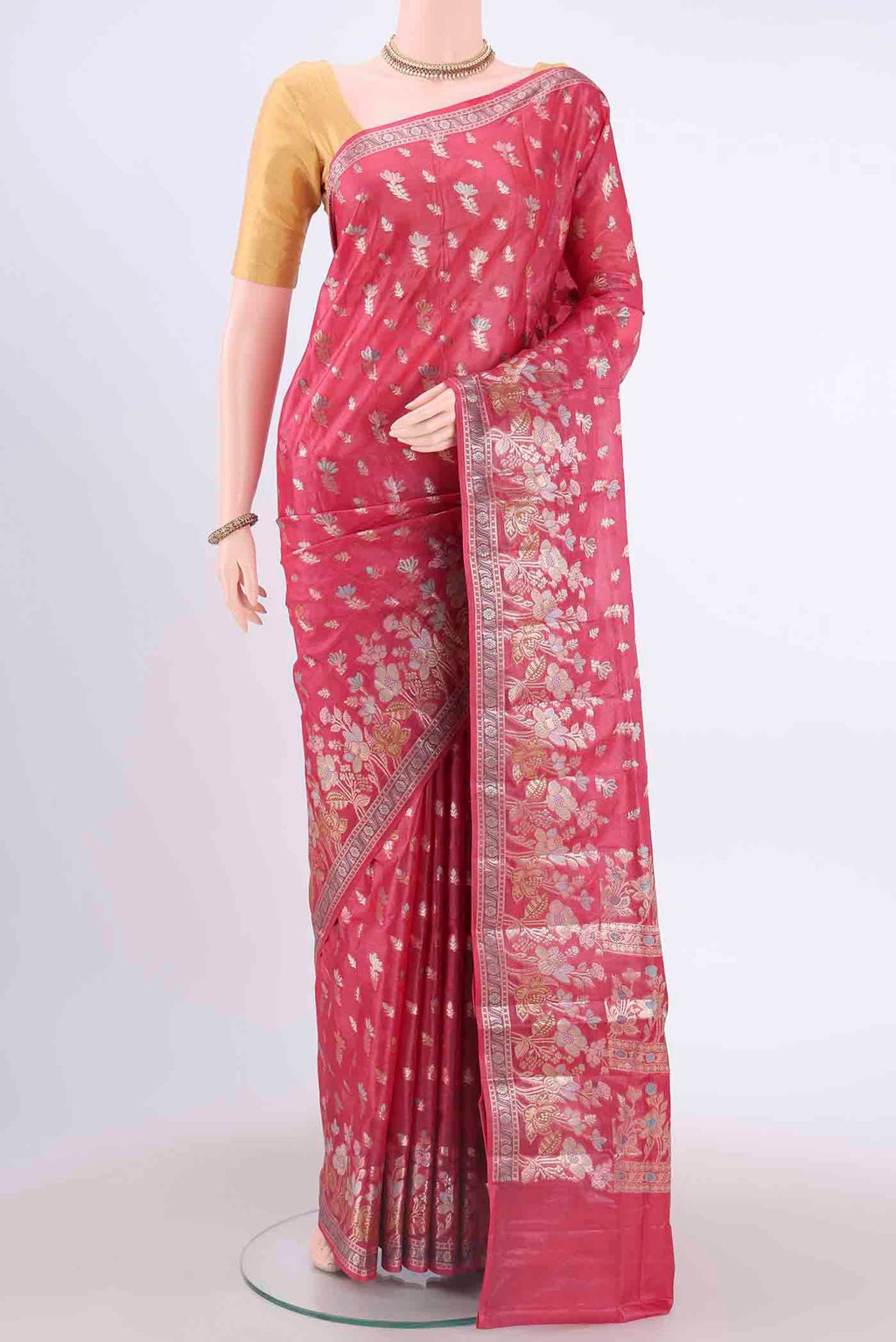 Pink Banarasi Tussar Silk Saree with Zari And Thread Butta on the body and Zari And Thread Border displayed on a mannequin