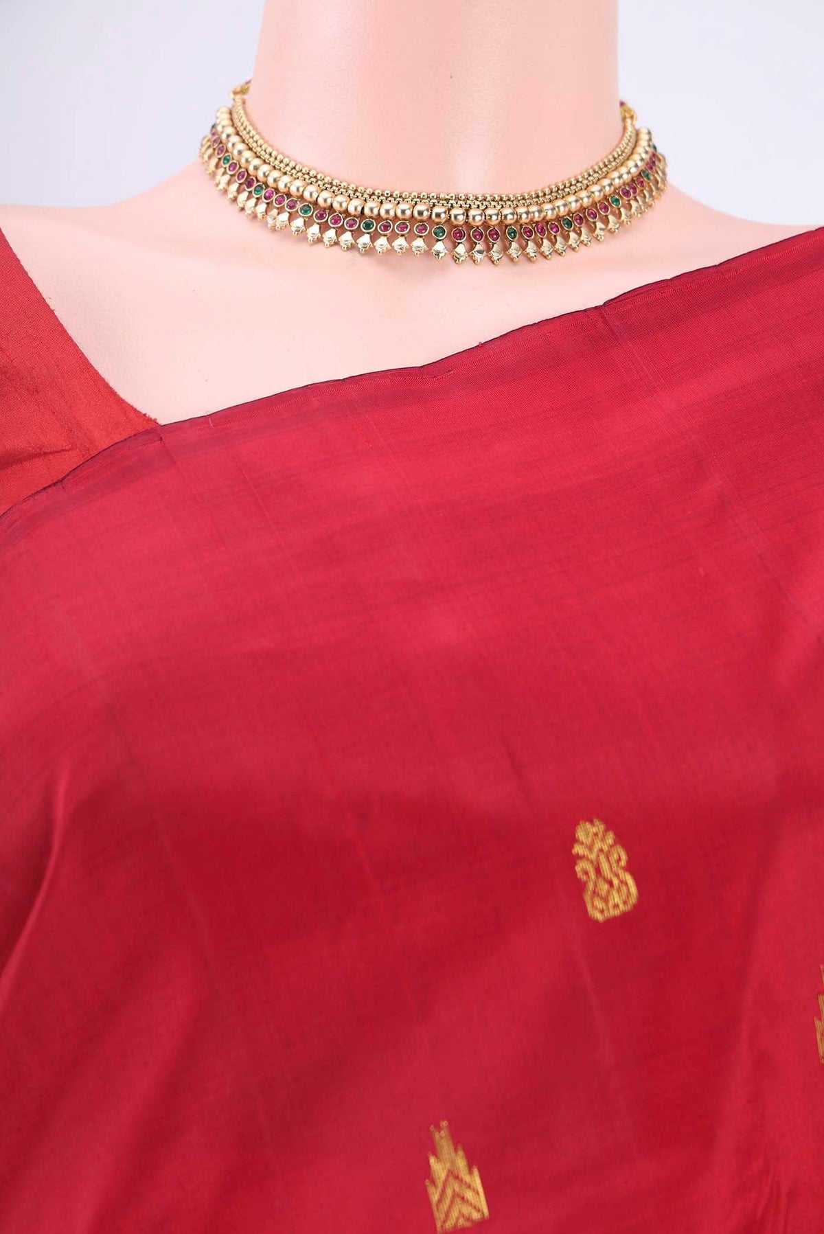 Border image of Red Kanchipuram Silk Saree with Zari Butta on the body and One Side Border