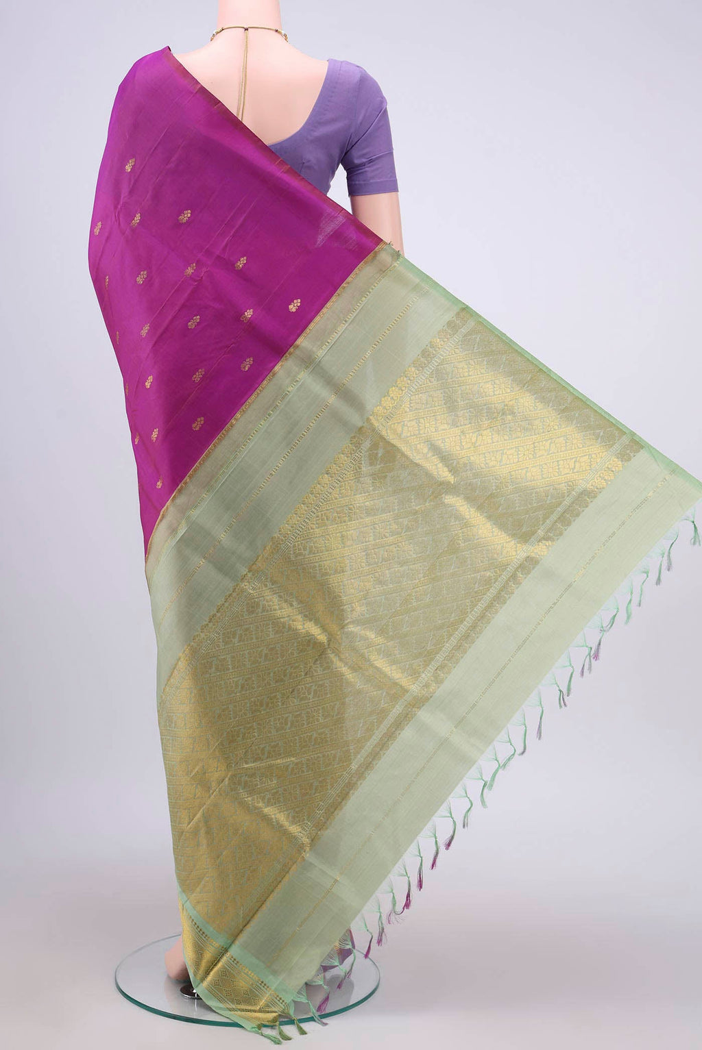 Flat view of Pink Kanchipuram Silk Saree with Zari Butta on the body and One Side Border
