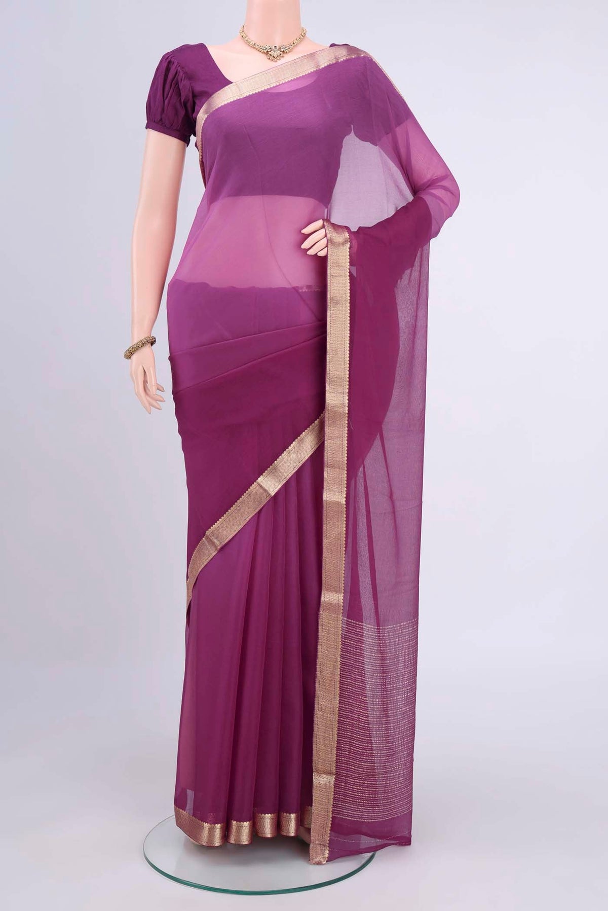 Light Magenta Dual Tone Mysore Chiffon Saree with Plain Body and Zari Border displayed on a mannequin