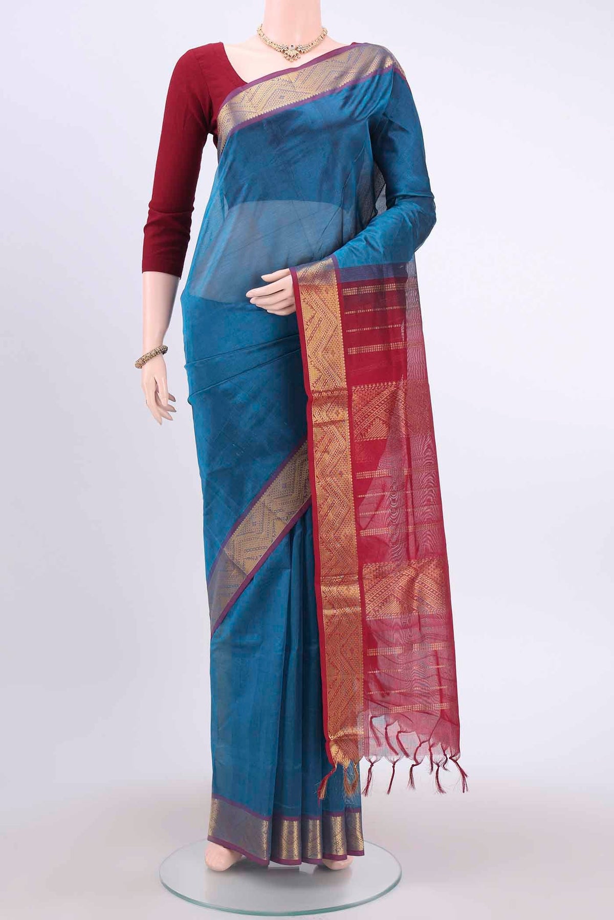 Blue Silk Cotton Saree with Plain Body and Zari Border displayed on a mannequin