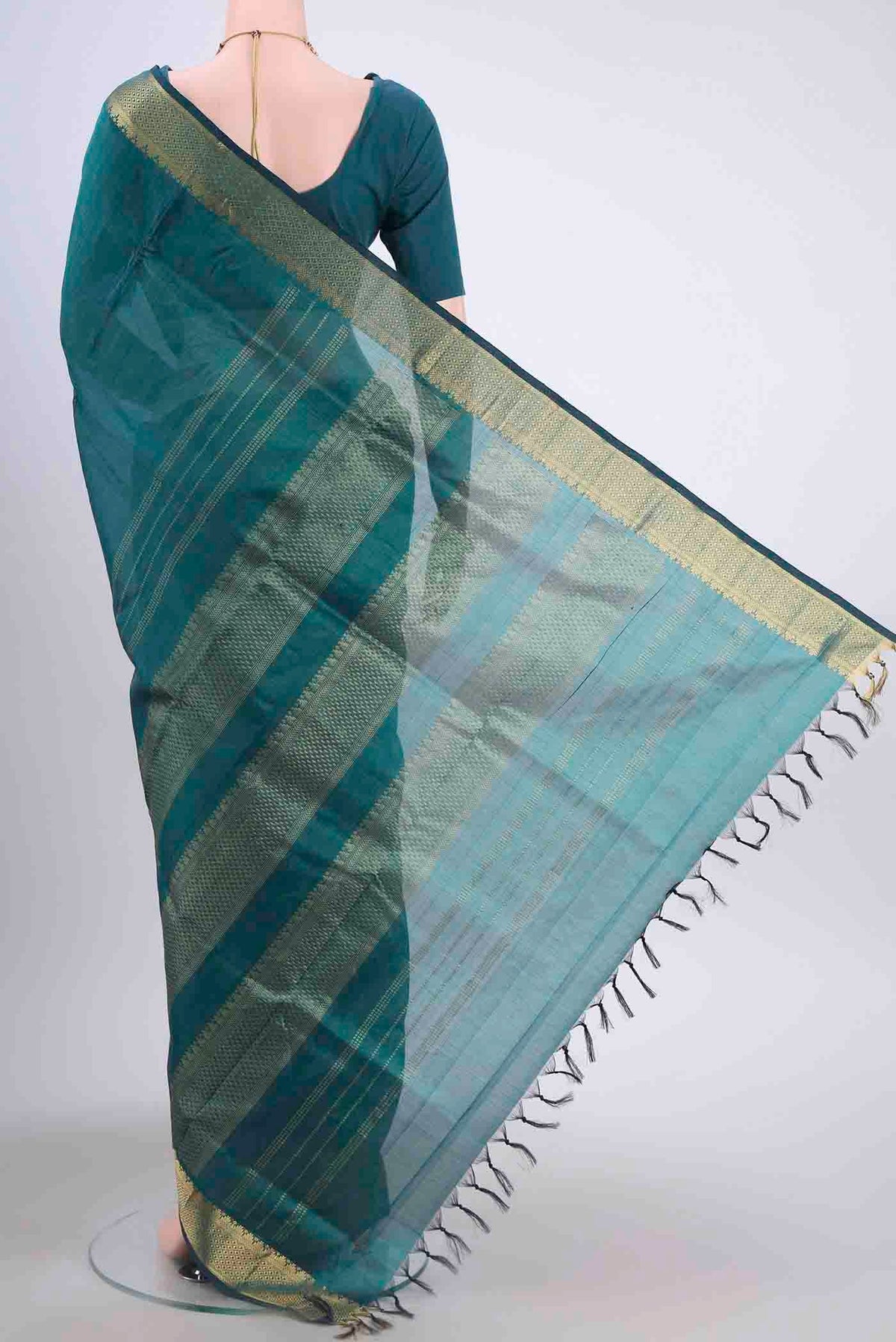 Flat view of Sea Green Silk Cotton Saree with Plain Body and Zari Border