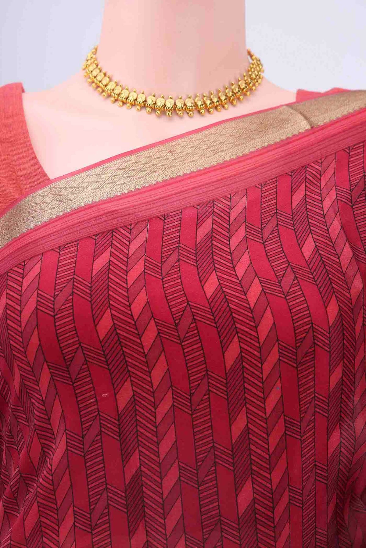 Border image of Maroon Mysore Crepe Saree with Floral Print on the body and Zari Border