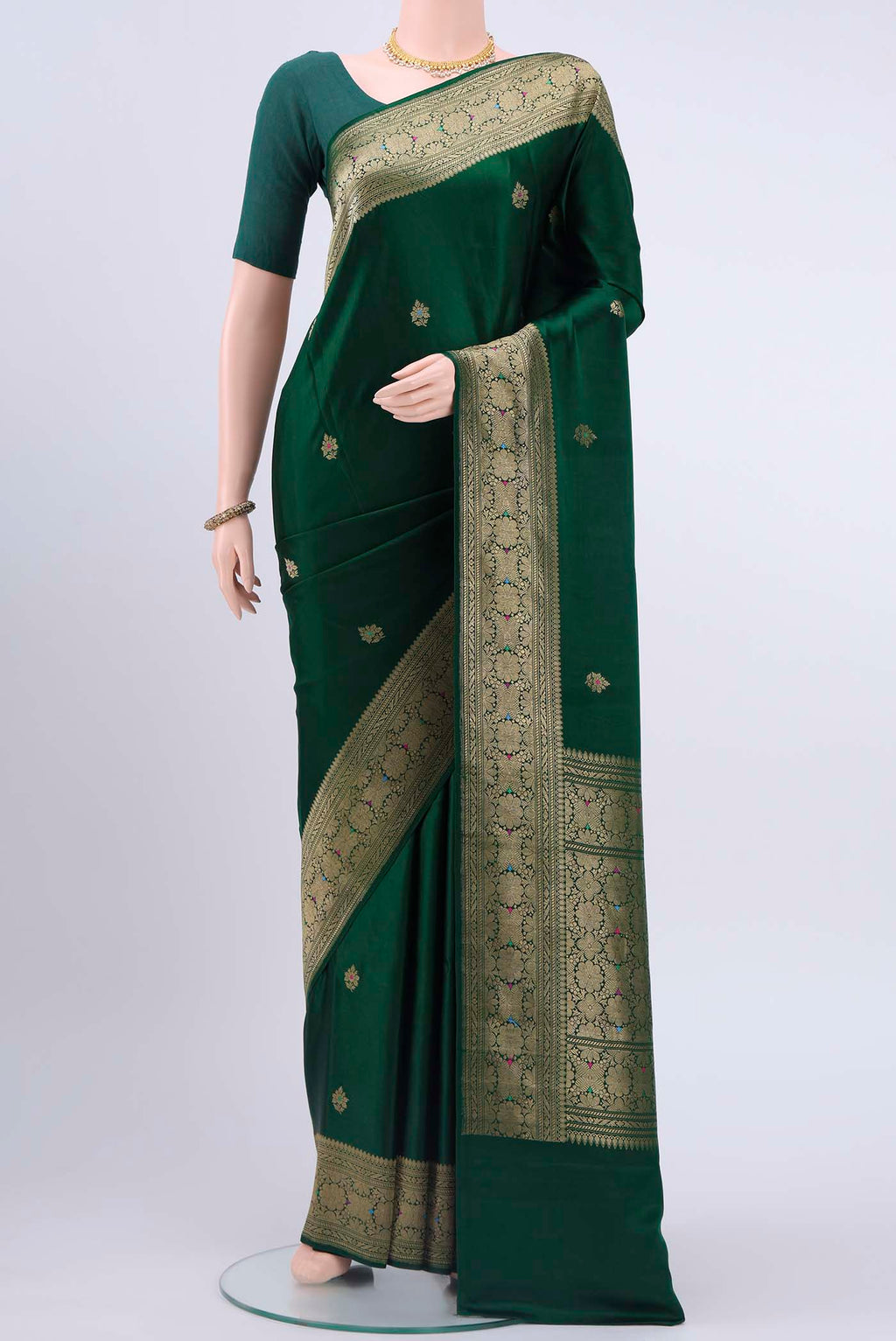 Bottle Green Dual Tone Banarasi Silk Saree with Zari And Thread Butta on the body and Zari And Thread Border displayed on a mannequin