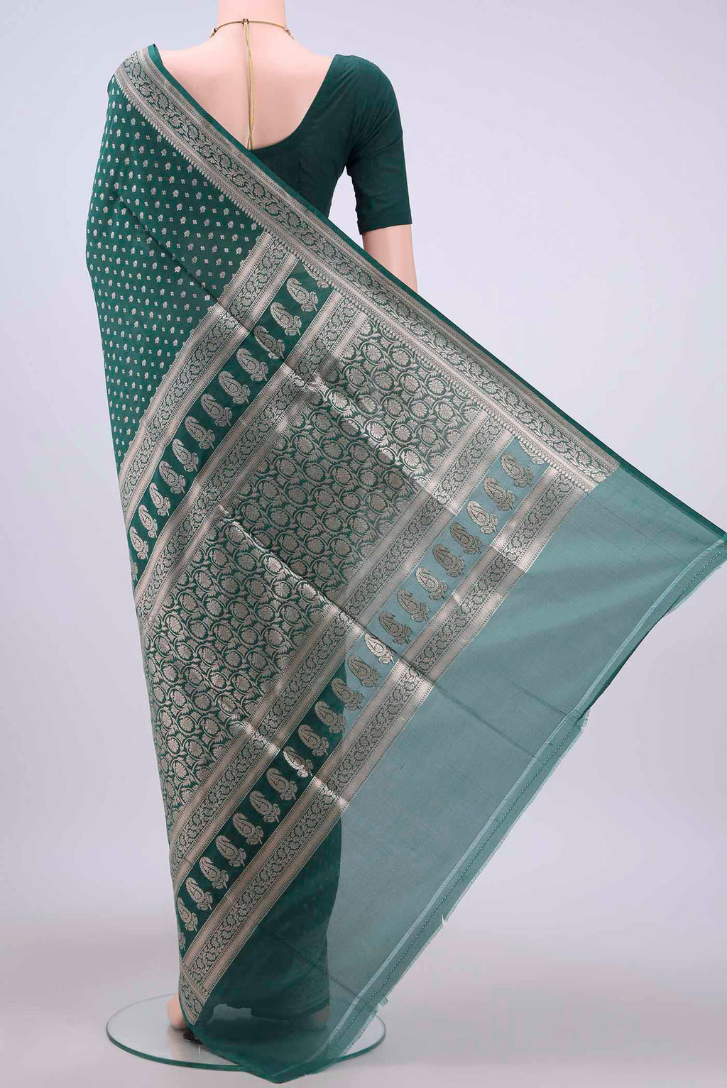 Flat view of Green Banarasi Silk Saree with Zari Butta on the body and Zari Border