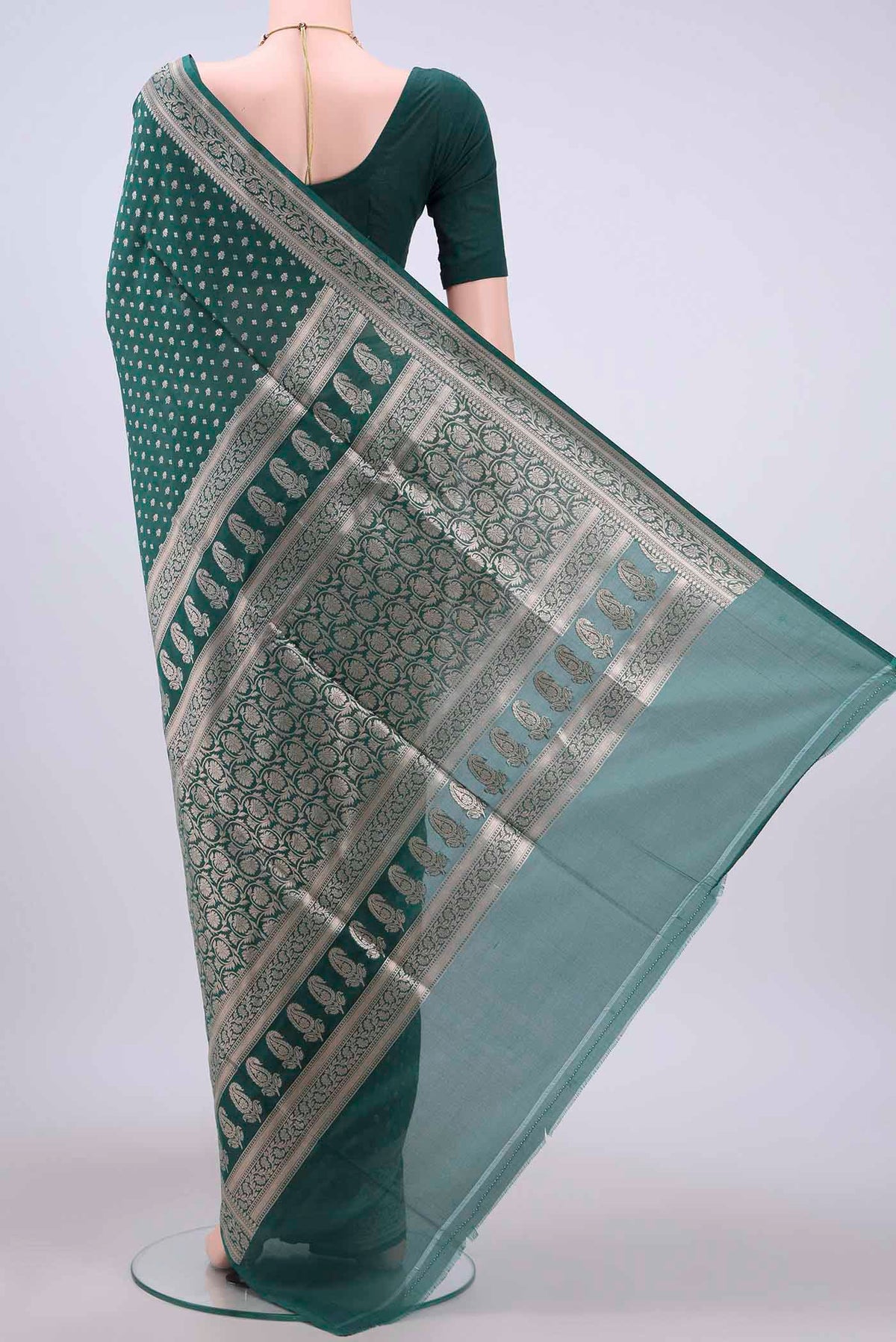 Flat view of Green Banarasi Silk Saree with Zari Butta on the body and Zari Border