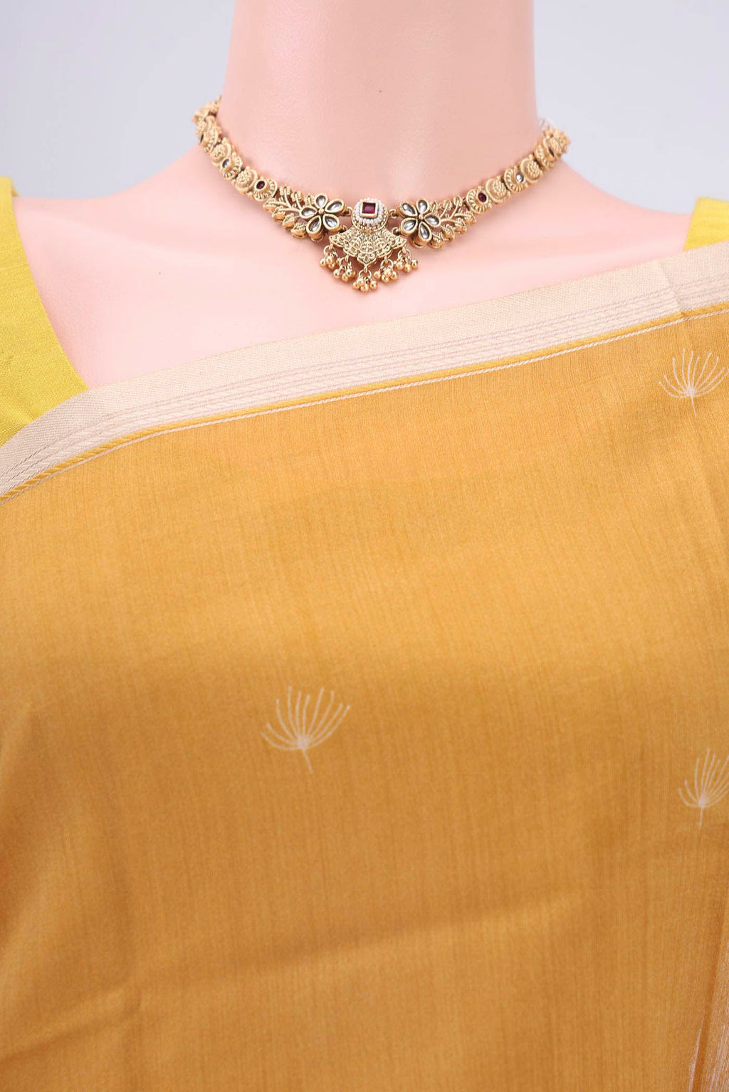 Border image of Yellow Tussar Silk Saree with Printed design on the body and Printed Border