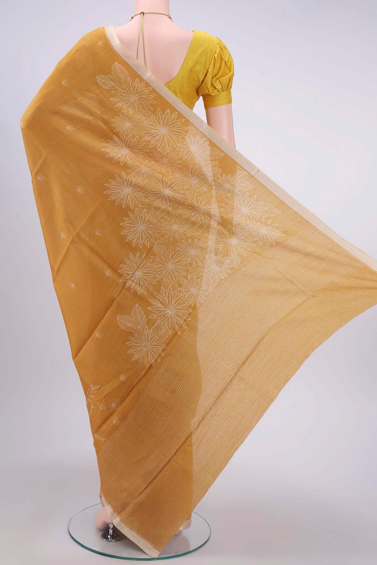 Flat view of Yellow Tussar Silk Saree with Printed design on the body and Printed Border