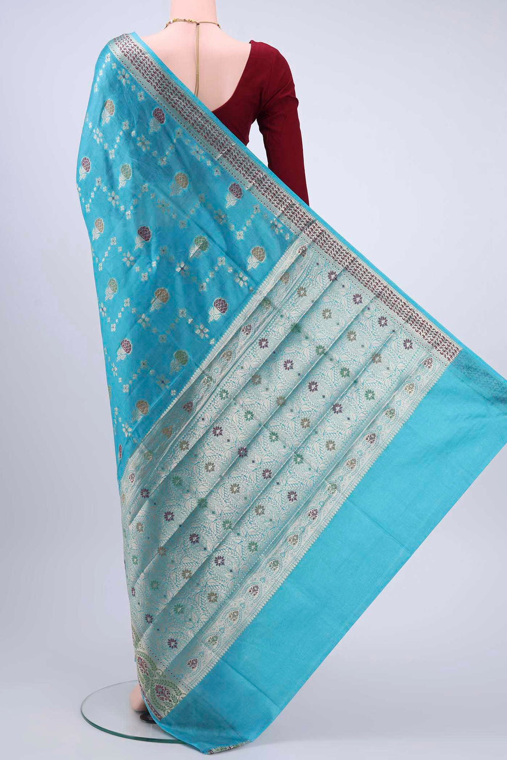 Flat view of Blue Banarasi Raw Silk Saree with Zari And Thread Butta on the body and Zari Border