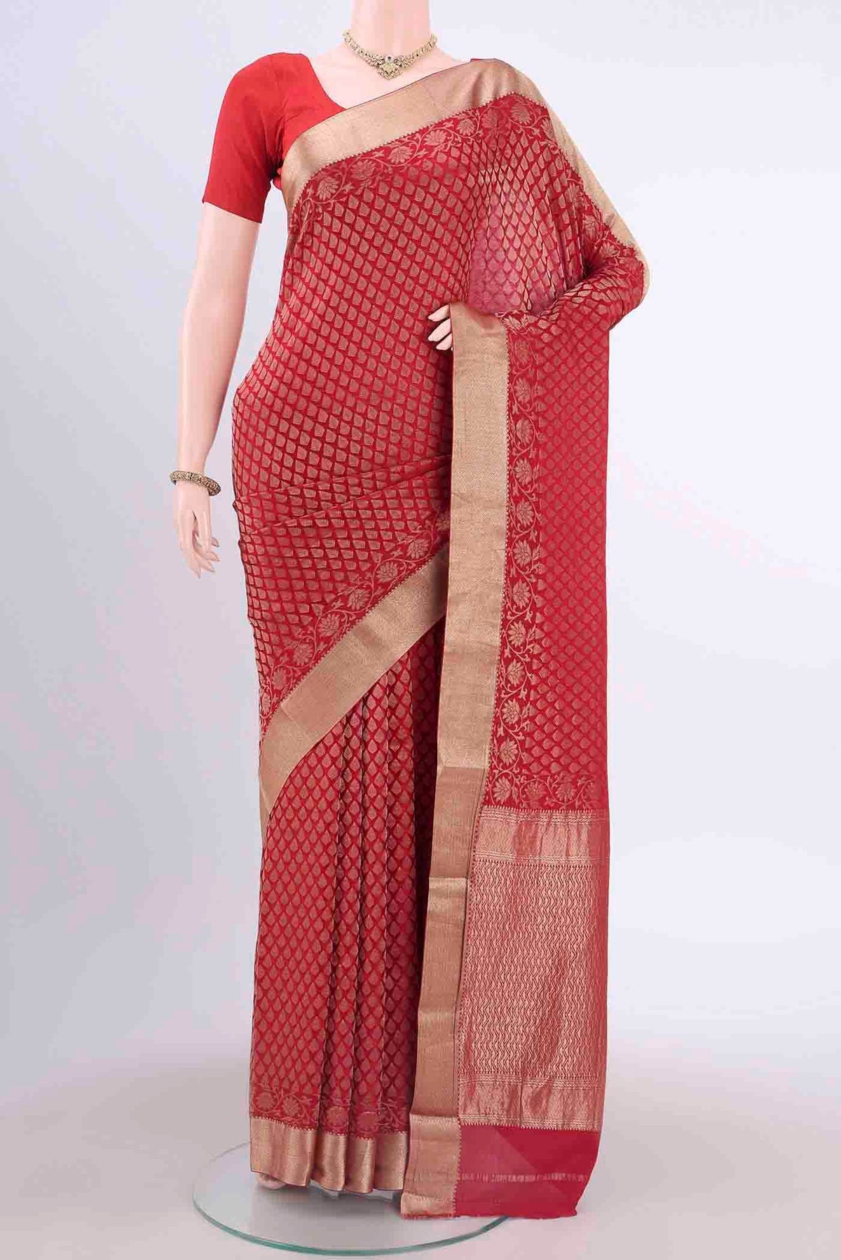 Maroon Dual Tone Mysore Crepe Saree with Zari Brocade on the body and Zari Border displayed on a mannequin