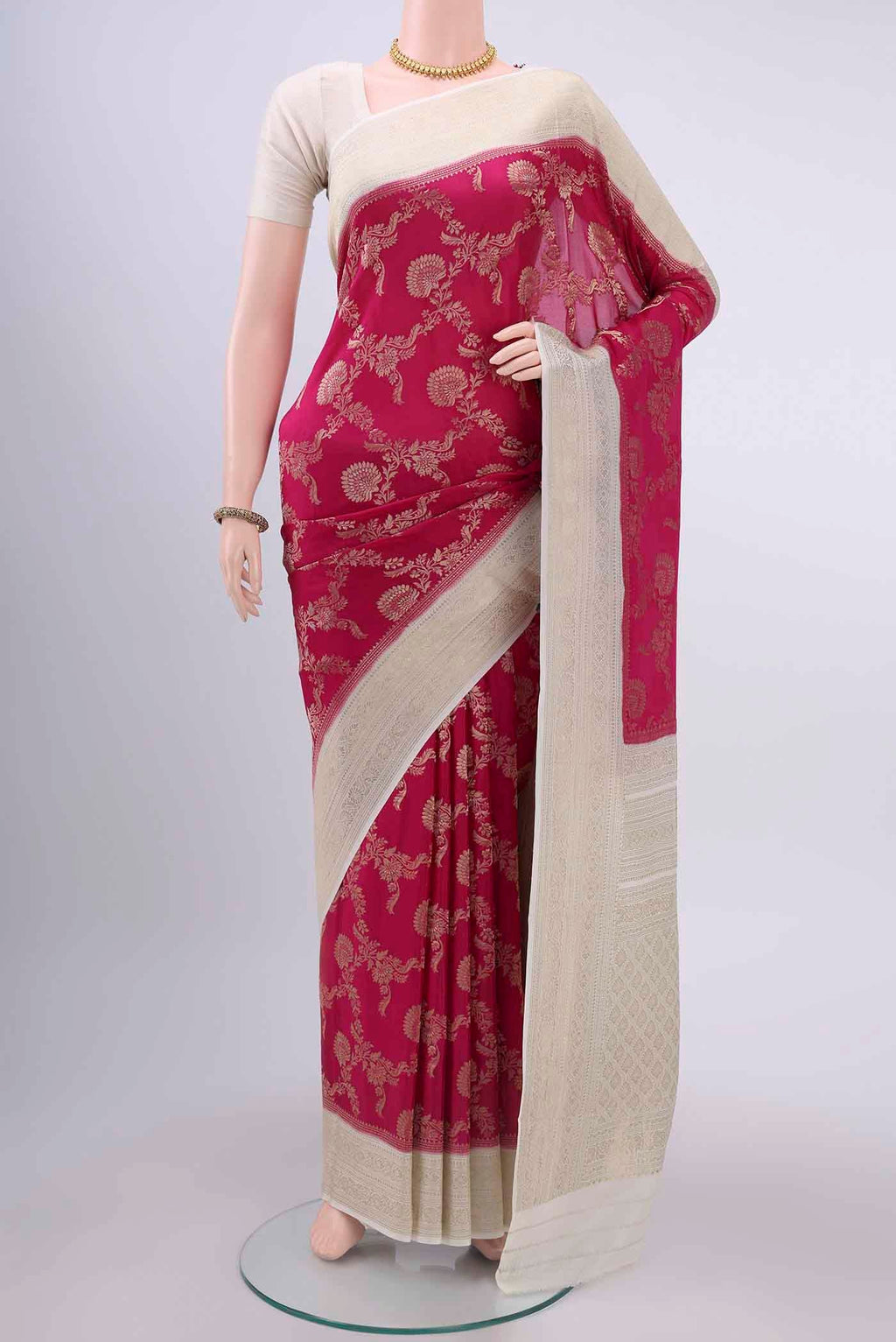 Rani Pink Mysore Crepe Saree with Zari Brocade on the body and Zari Border displayed on a mannequin