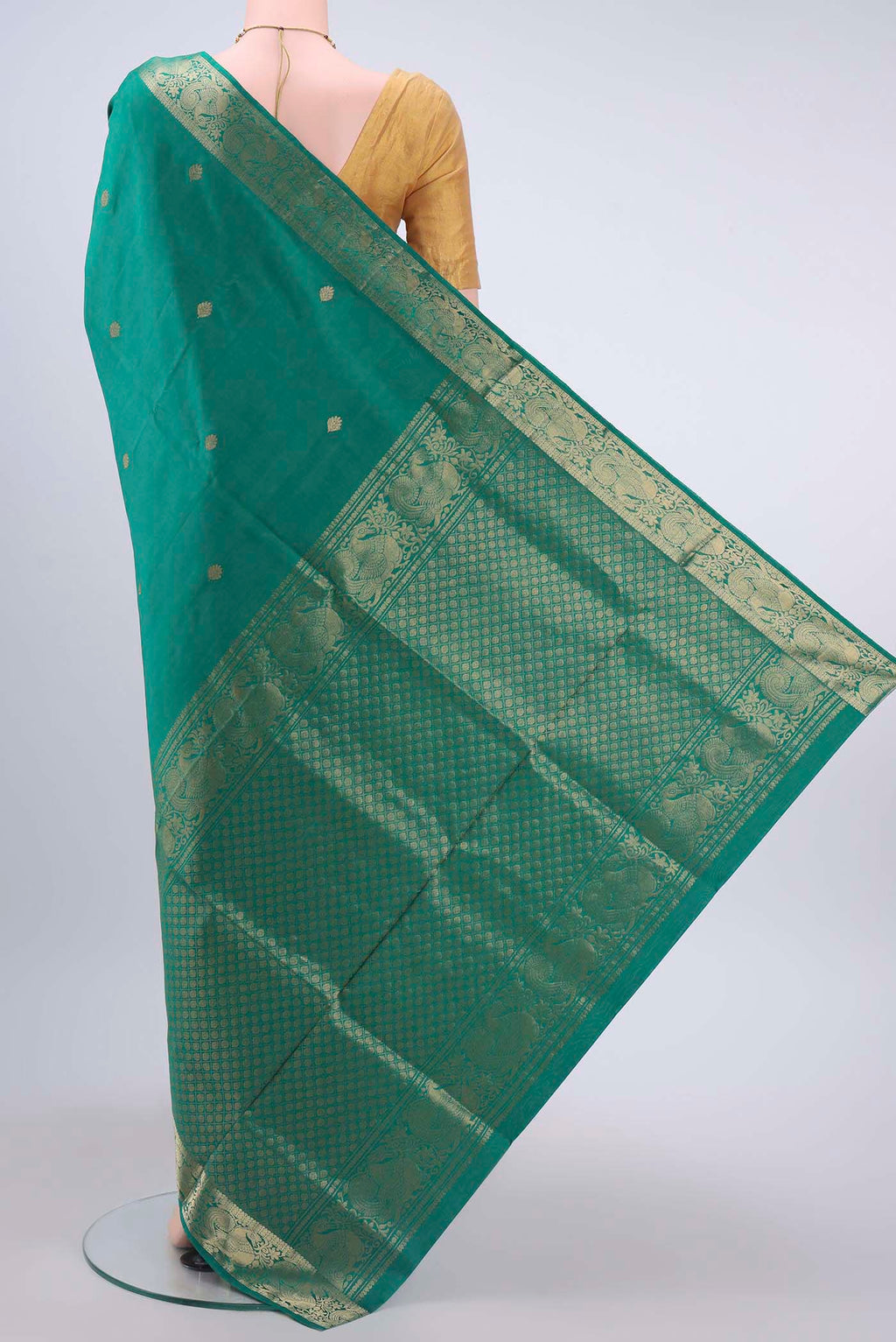 Flat view of Green Soft Silk Saree with Jacquard With Zari Butta on the body and Zari Border