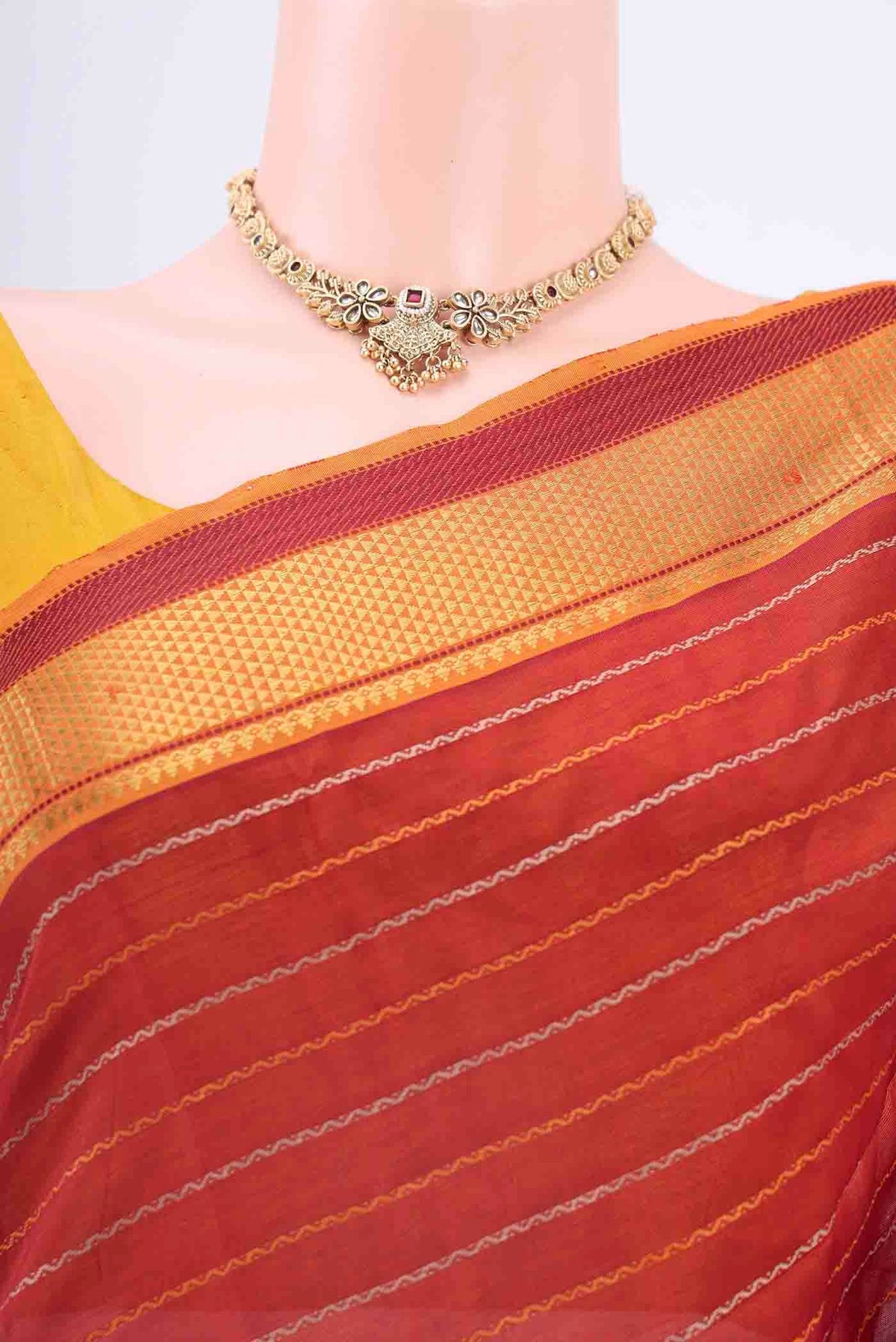 Border image of Maroon Silk Cotton Saree with Veldhari on the body and Zari Border