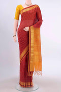 Maroon Silk Cotton Saree with Veldhari on the body and Zari Border displayed on a mannequin