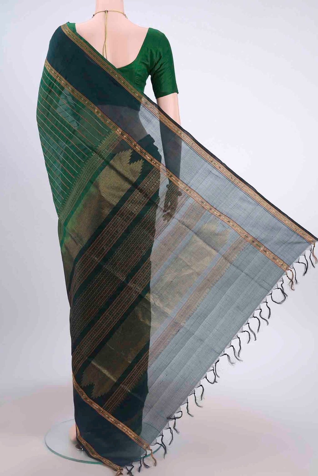 Flat view of Green Silk Cotton Saree with Veldhari on the body and Zari Border