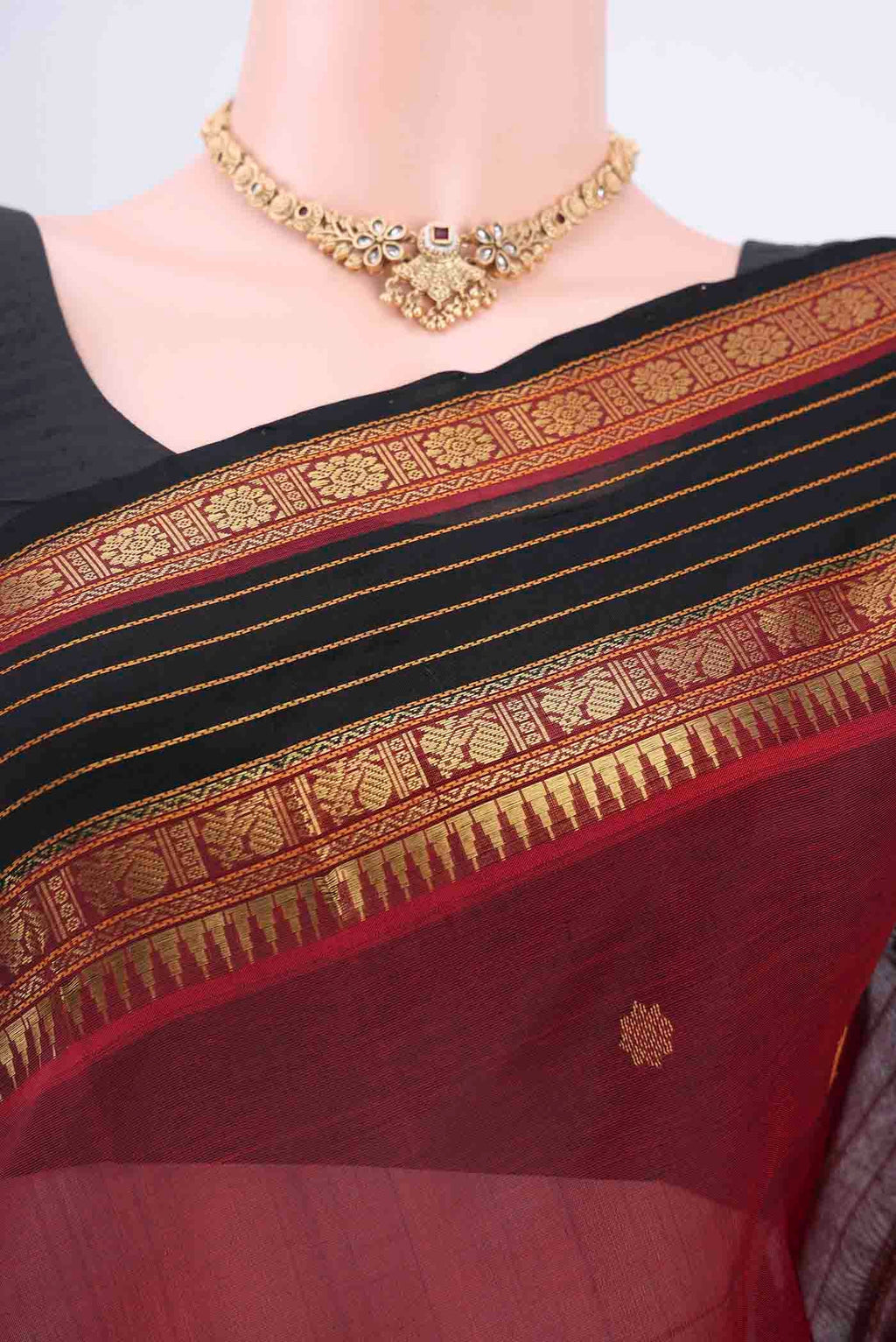 Border image of Maroon Silk Cotton Saree with Zari Butta on the body and Zari Border