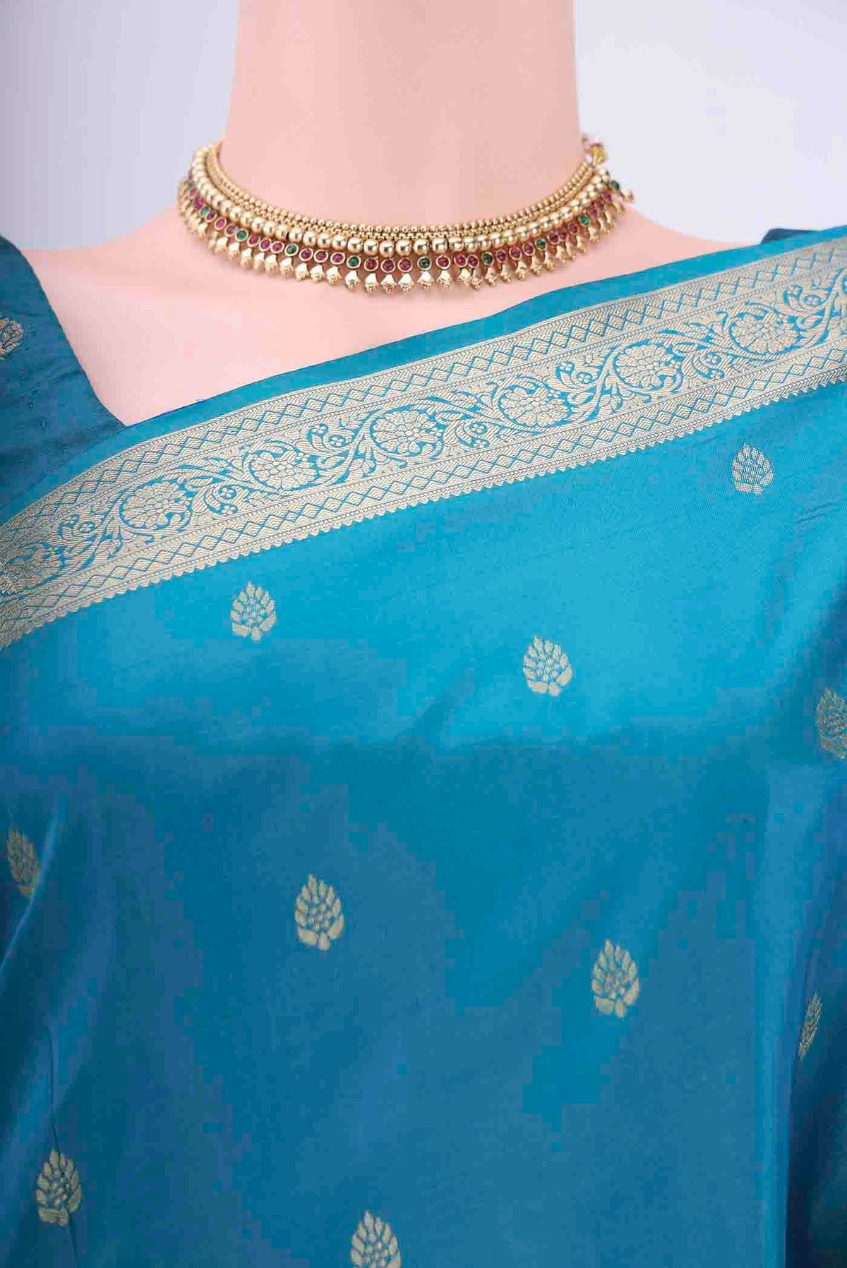 Border image of Blue Dual Tone Soft Silk Saree with Zari Butta on the body and Zari Border